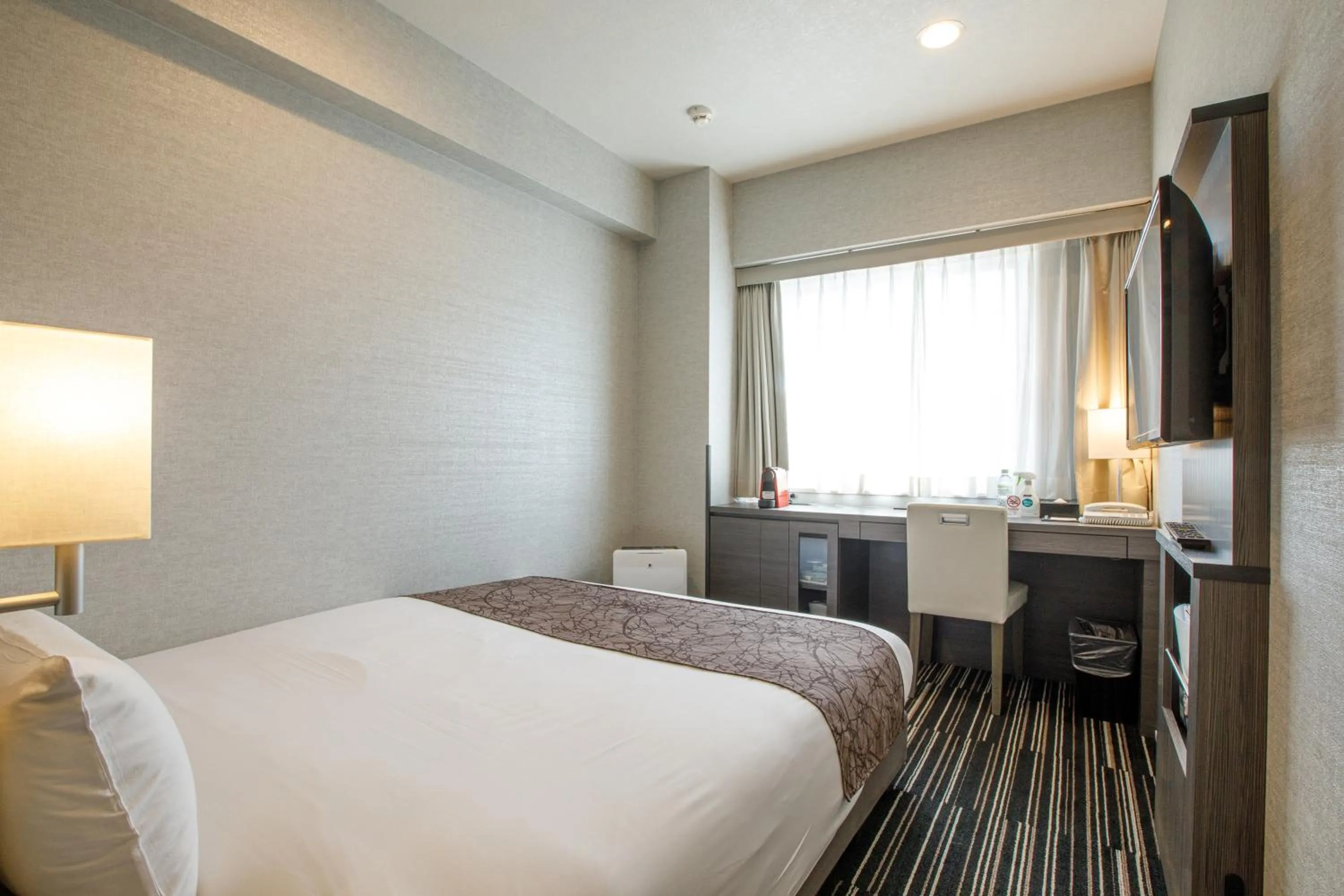 Bed in Hotel Sunroute Fukuchiyama