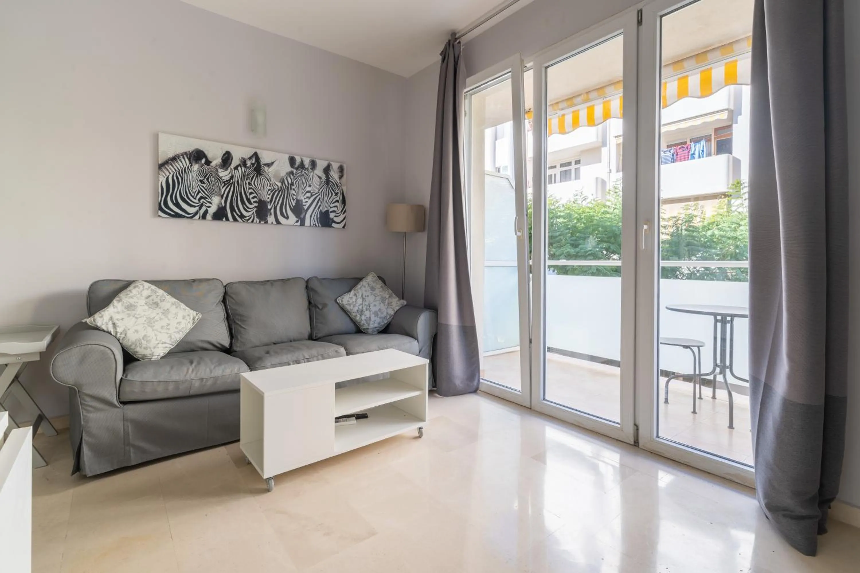 Living room in Apartamentos Castillo by Sur Suites