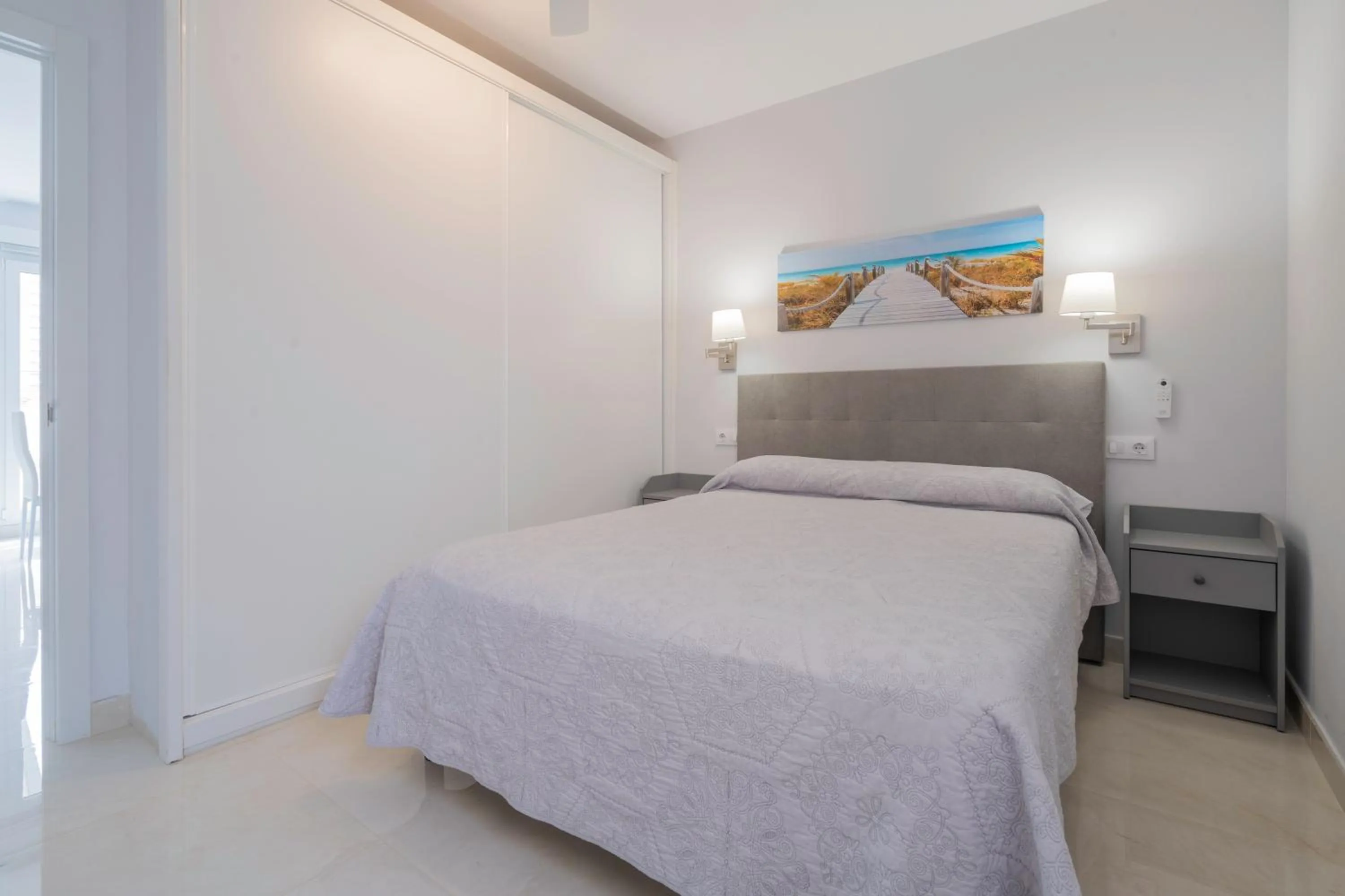 Bedroom, Bed in Apartamentos Castillo by Sur Suites