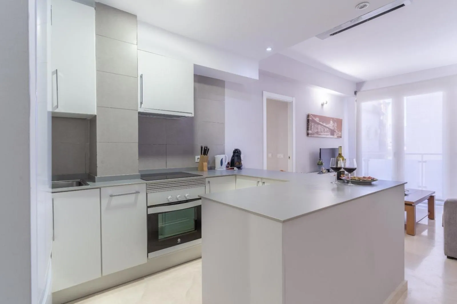 Kitchen or kitchenette in Apartamentos Castillo by Sur Suites