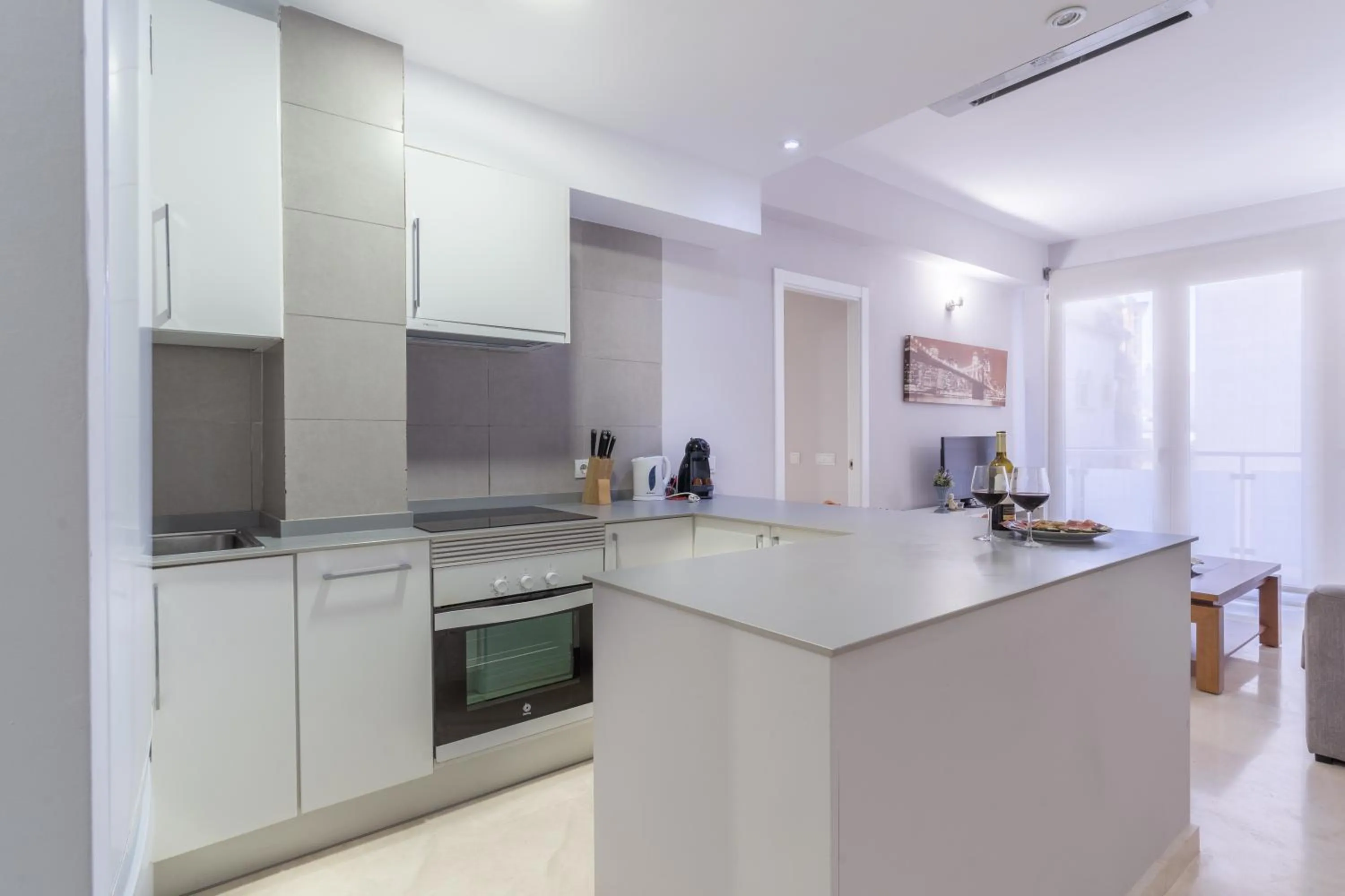 Kitchen or kitchenette in Apartamentos Castillo by Sur Suites