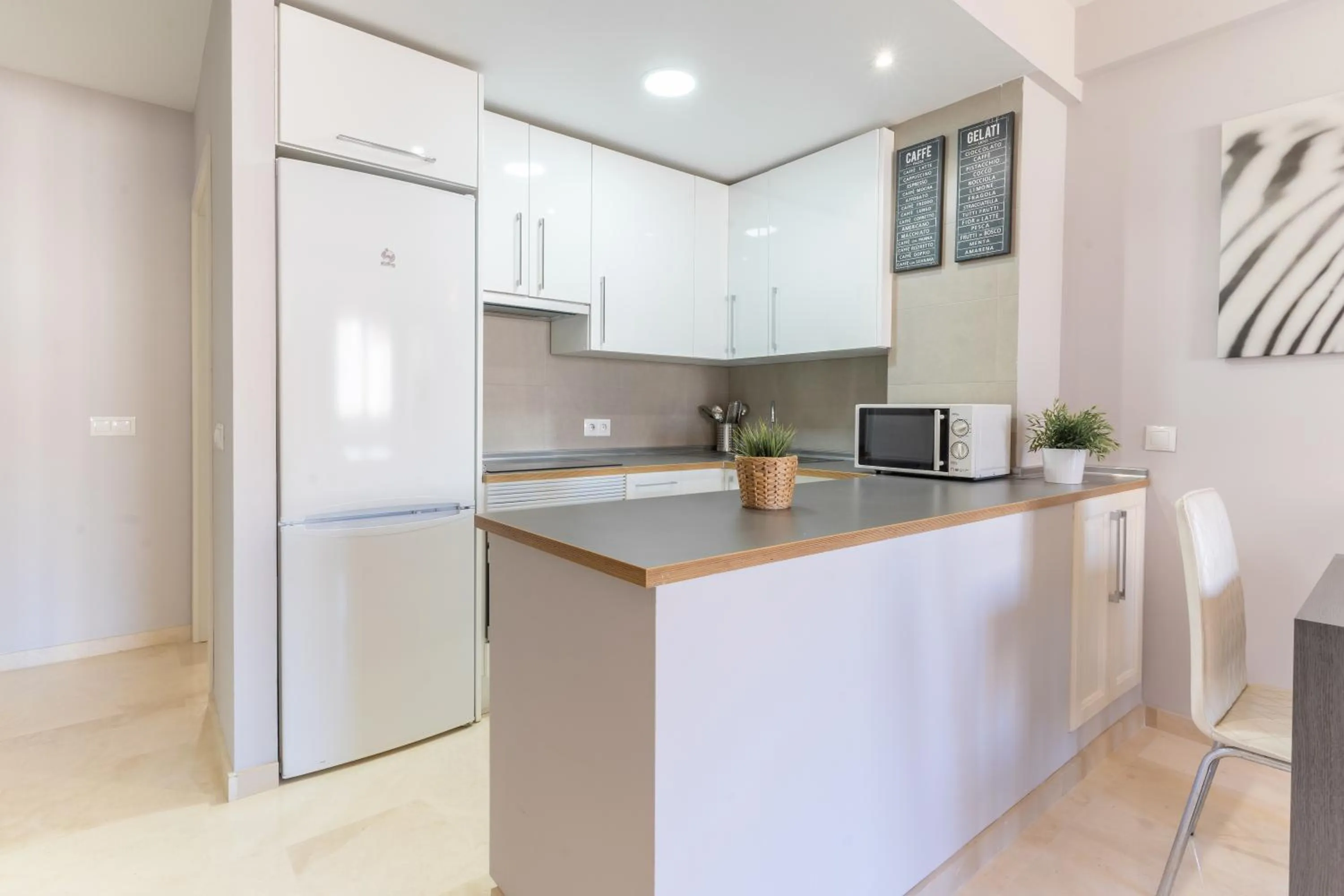 Kitchen or kitchenette in Apartamentos Castillo by Sur Suites