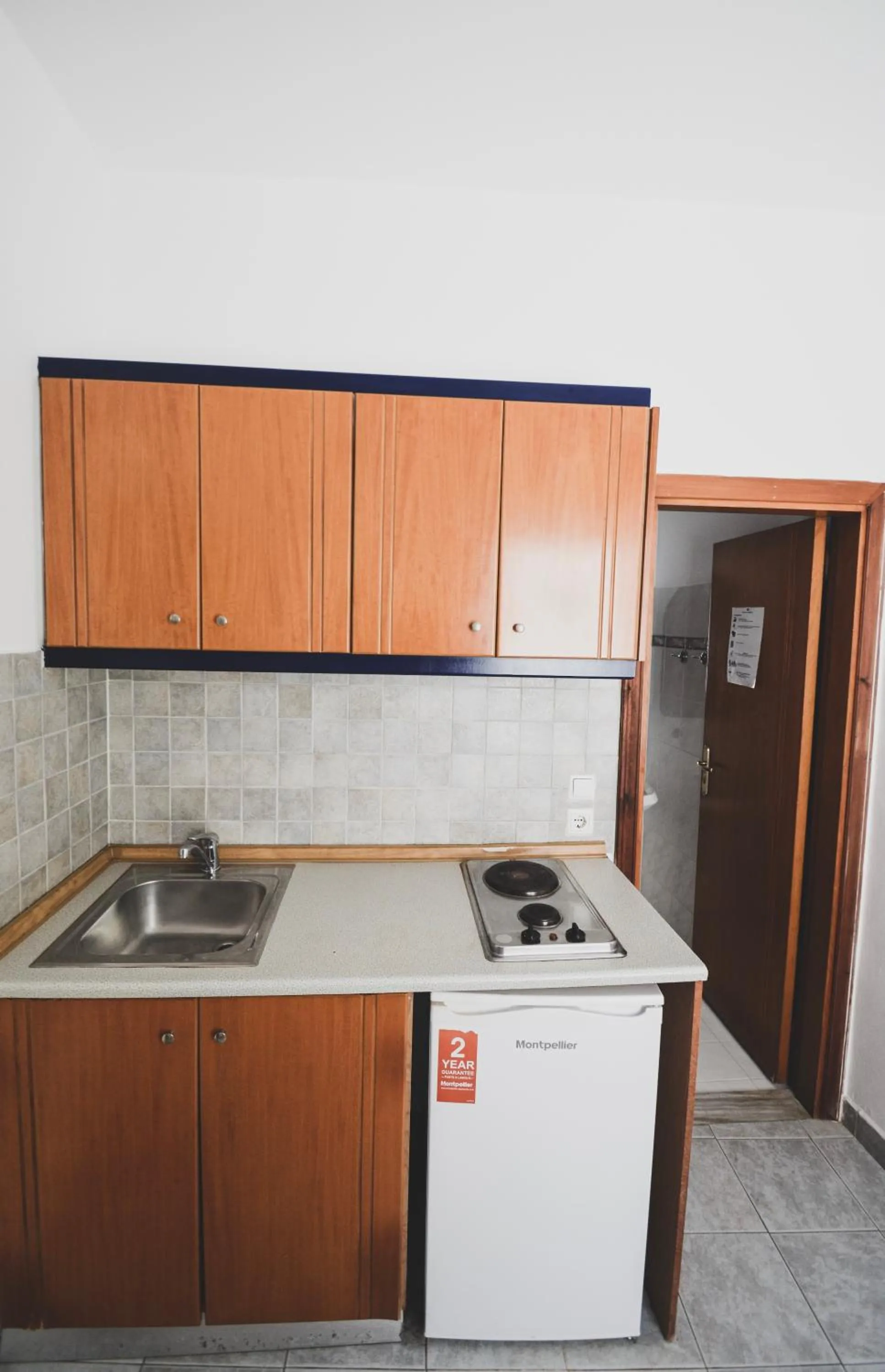 Kitchen or kitchenette in Coralli Apartments