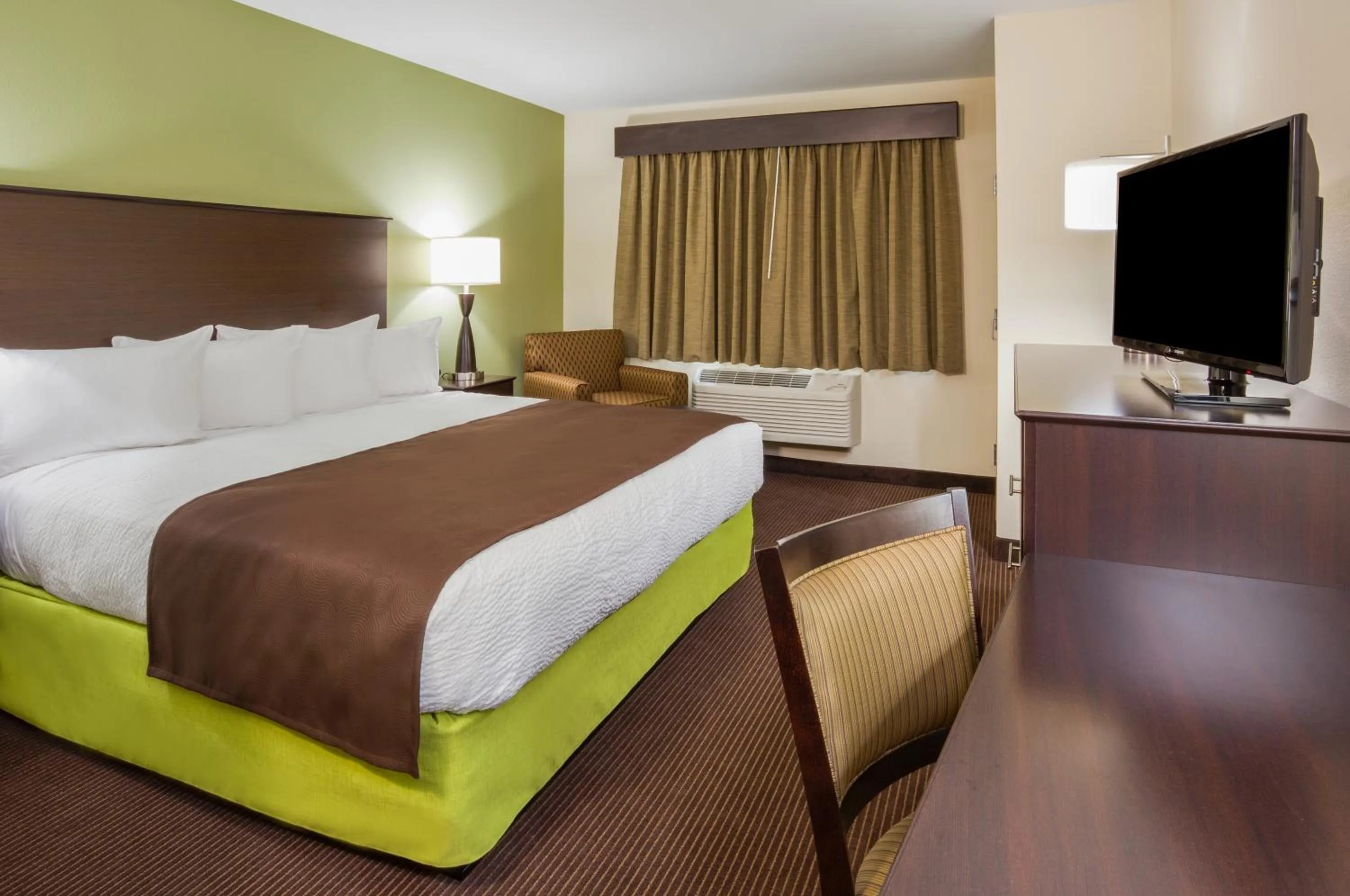 Bedroom, Bed in AmericInn by Wyndham Sibley