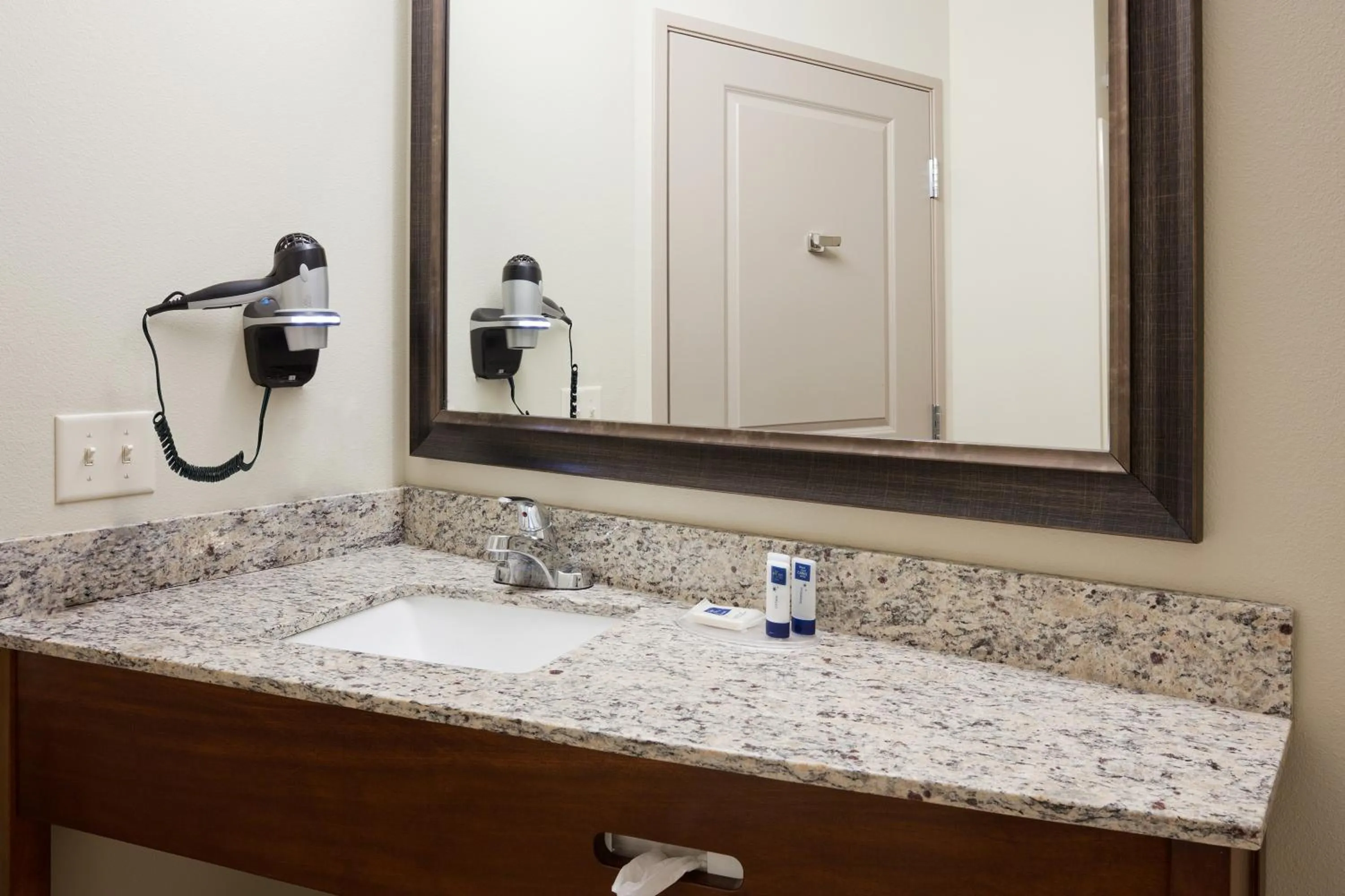 Bathroom in AmericInn by Wyndham Sibley