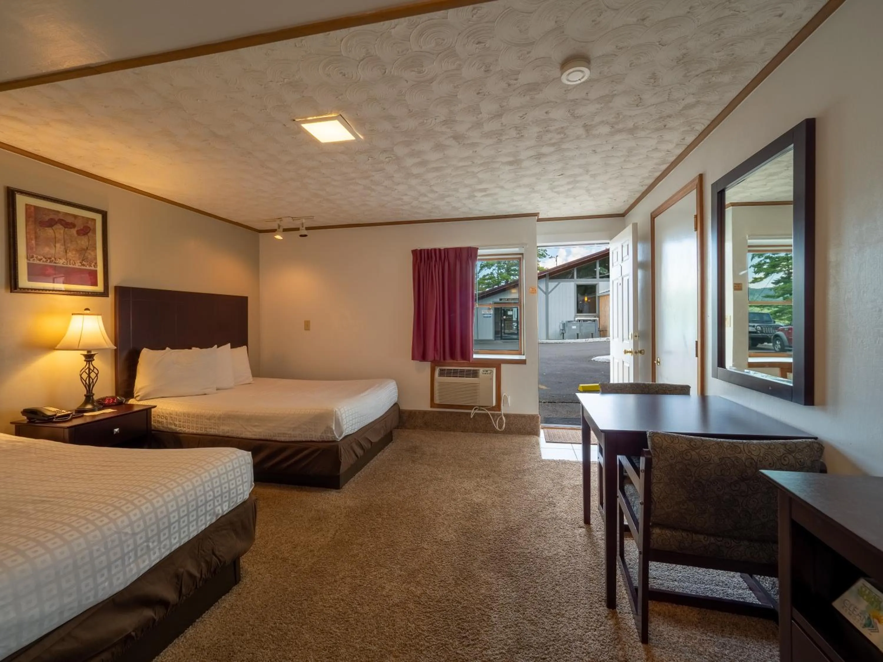 Photo of the whole room, Bed in Lake 'N Pines Motel