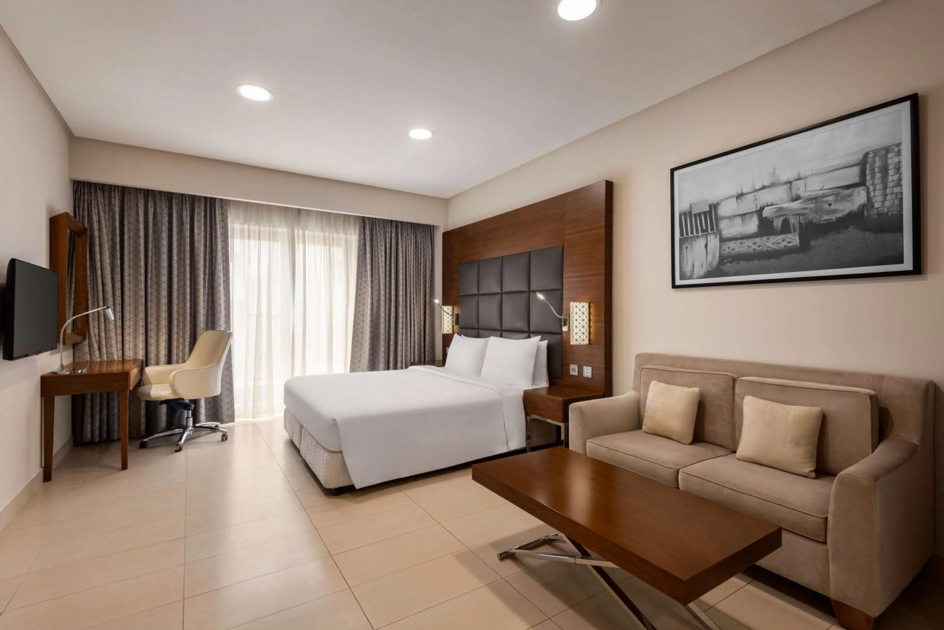 Bed in Levatio Suites Muscat, a member of Radisson Individuals