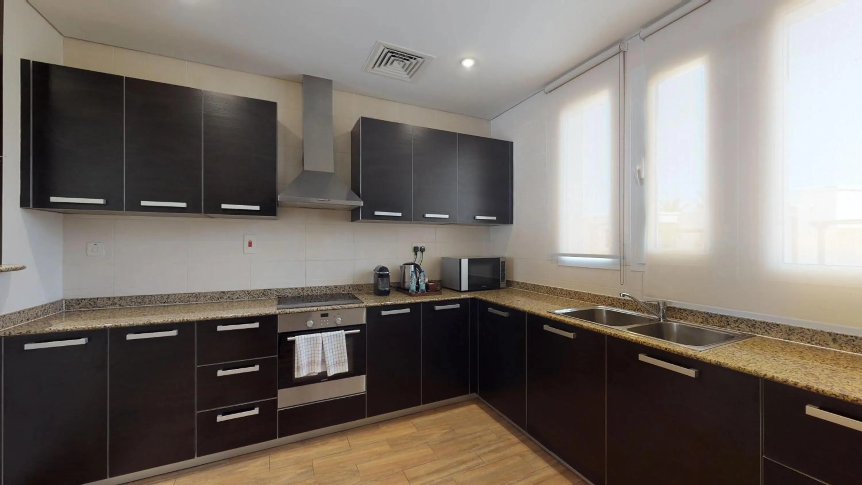 Kitchen or kitchenette in Simaisma A Murwab Resort