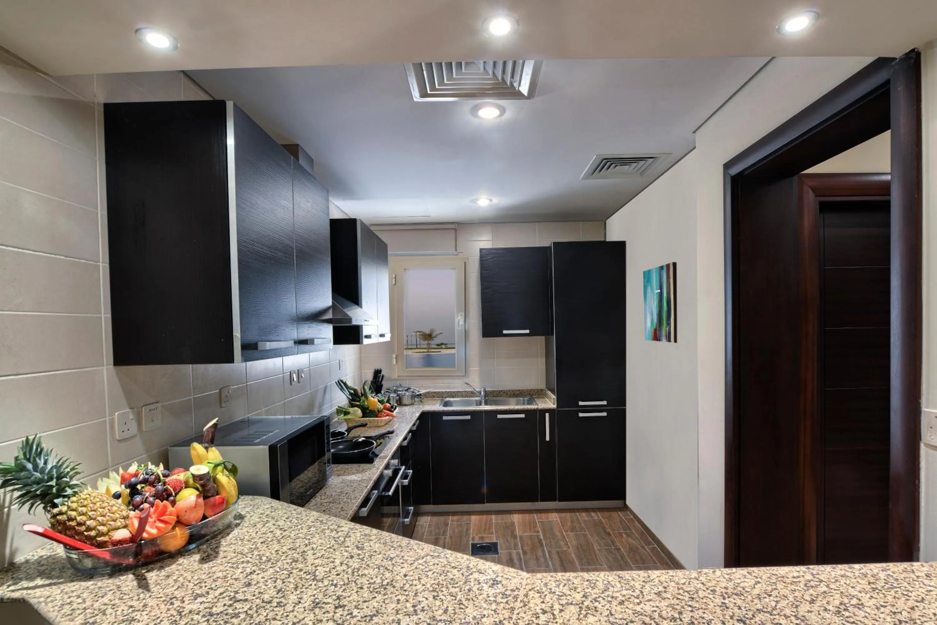 Kitchen or kitchenette in Simaisma A Murwab Resort