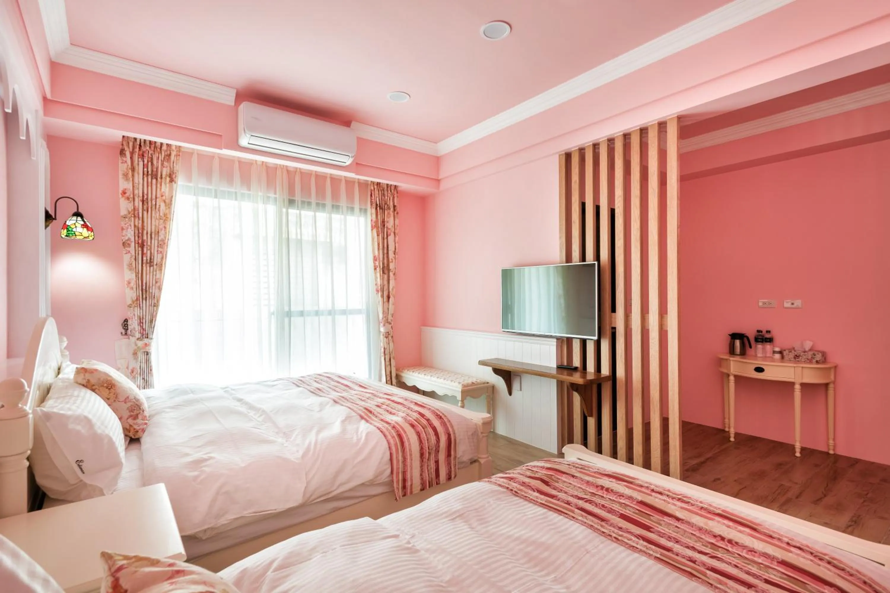 Photo of the whole room, Bed in 伊笛幔休閒民宿 電梯民宿 車位需預約