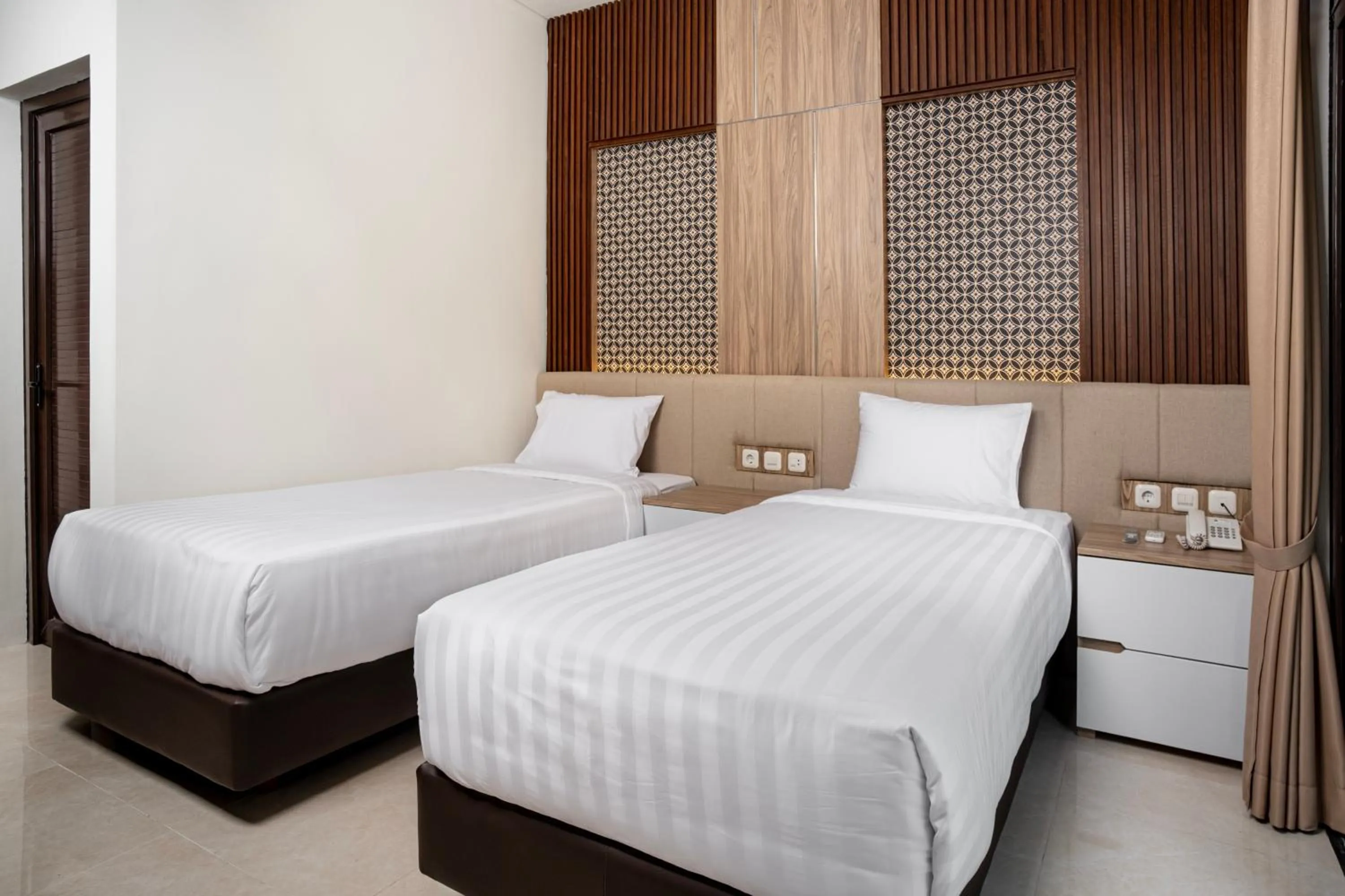 Bed in The Amrta Borobudur