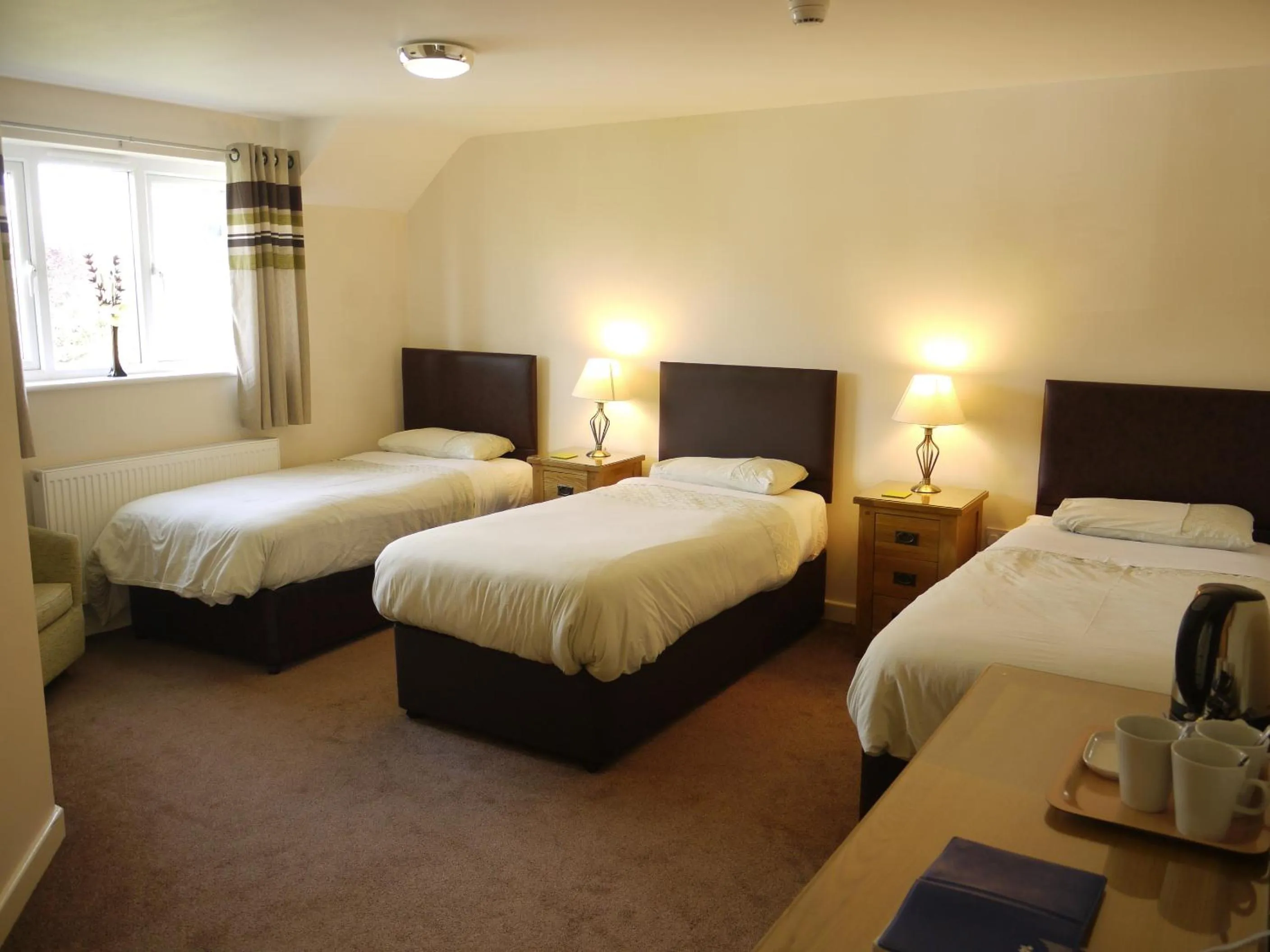 Bed in The New Inn Hotel