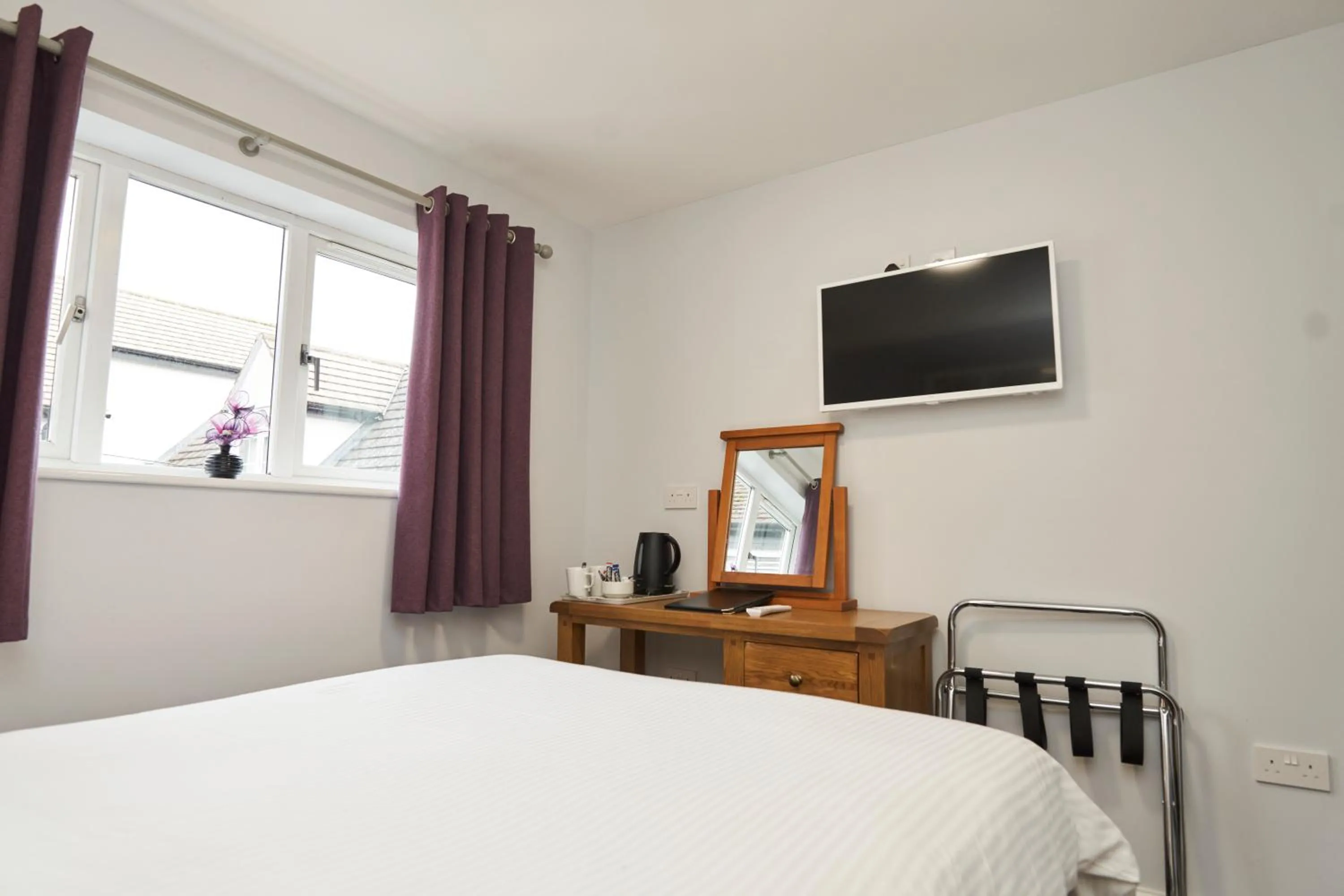 Bed in The New Inn Hotel