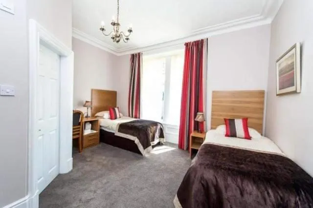 Bed in Belvedere Guest House