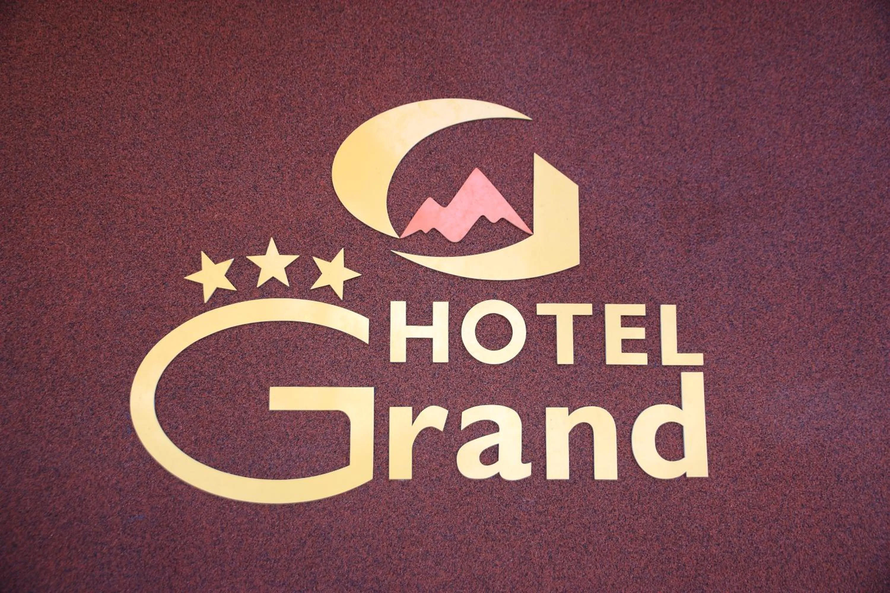 Property logo or sign in Hotel Grand