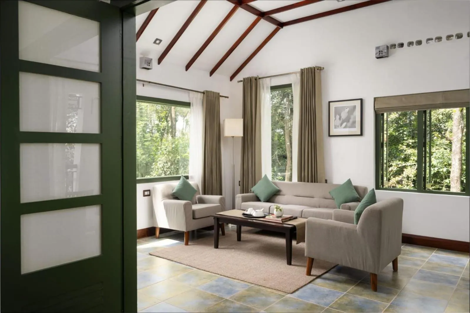 Living room in Reen Resorts Aanavilasam Plantation Thekkady