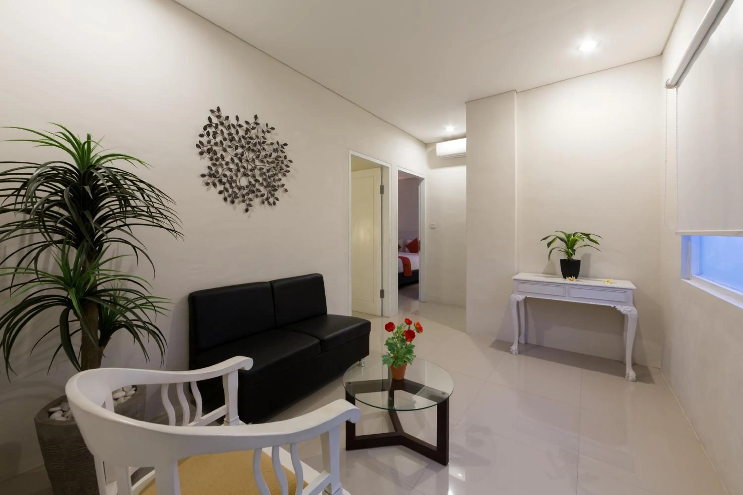 Living room in The Rinaya Canggu by ecommerceloka