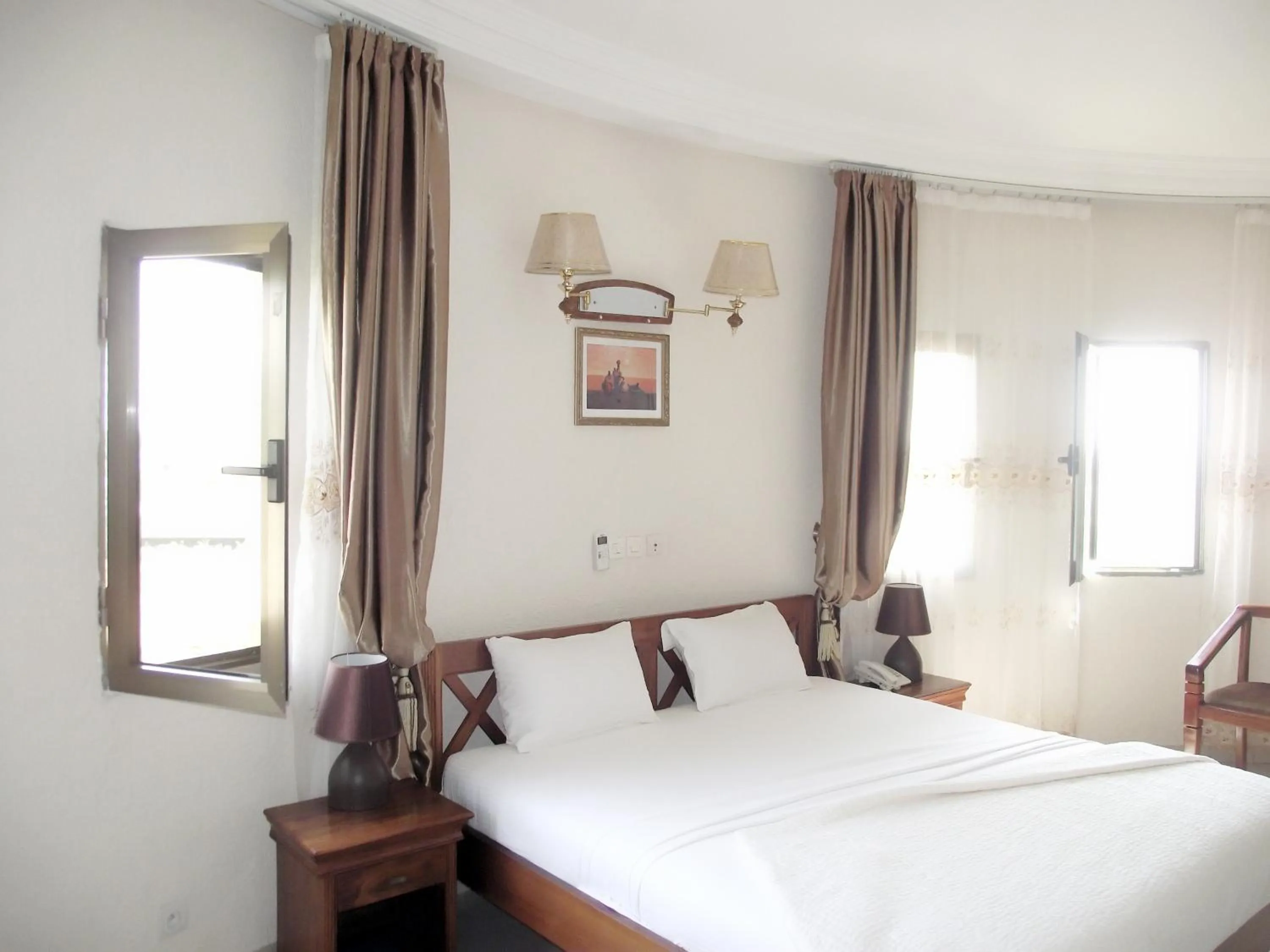 Bed in Hotel Ghis Palace