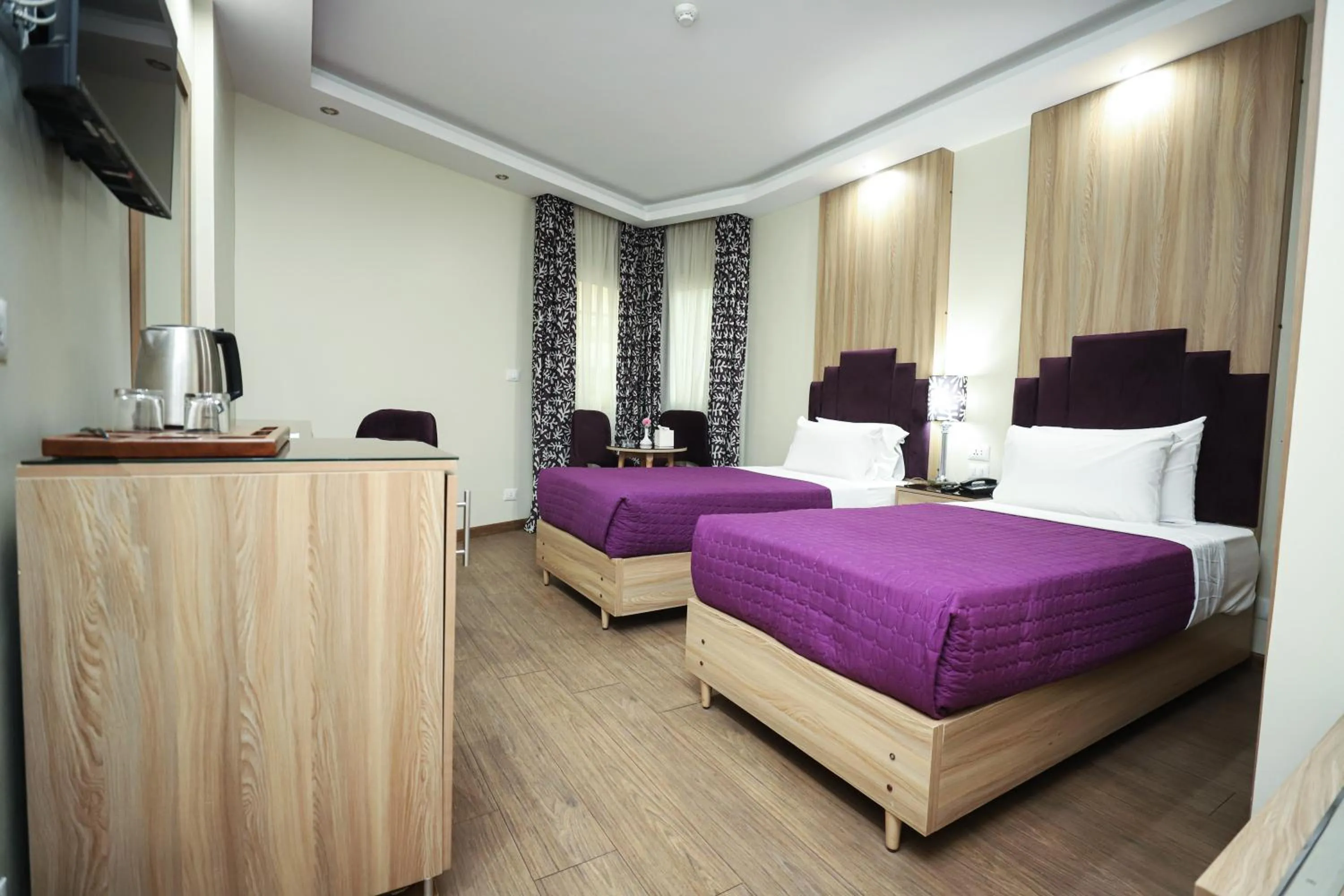 Photo of the whole room, Bed in Gawharet Al Ahram Hotel