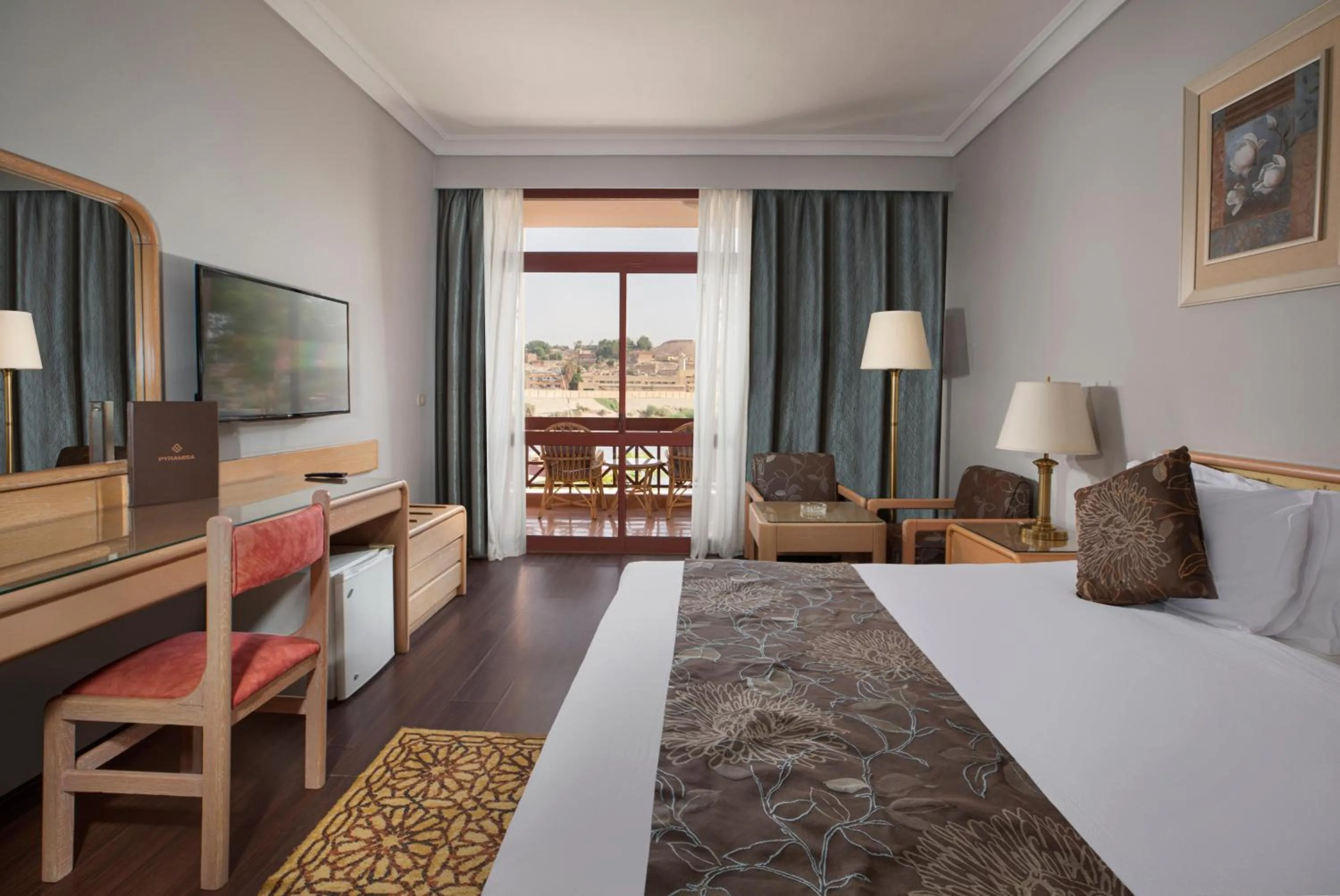 Photo of the whole room, Bed in Pyramisa Island Hotel Aswan