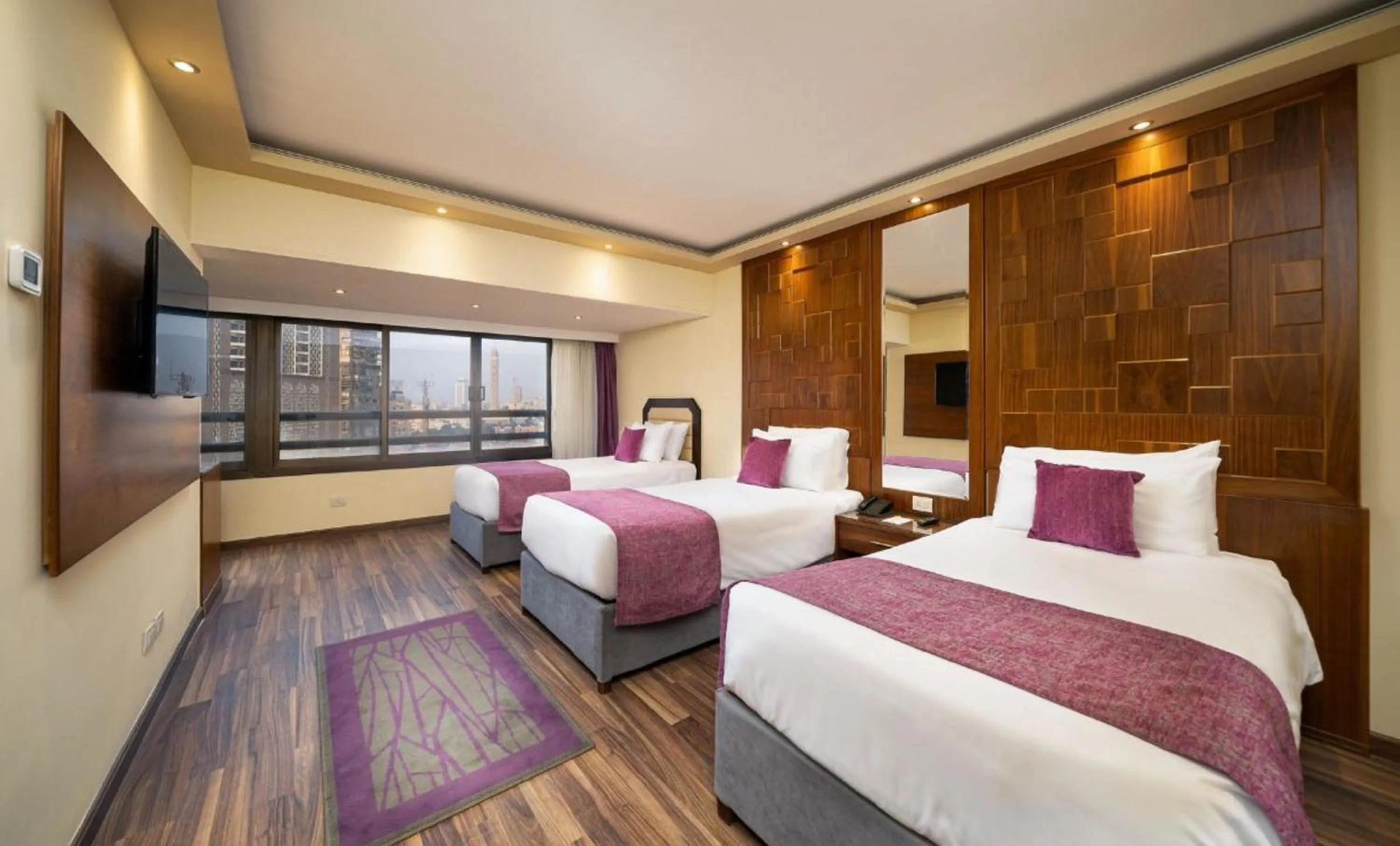 Bed in Pyramisa Suites Hotel Cairo