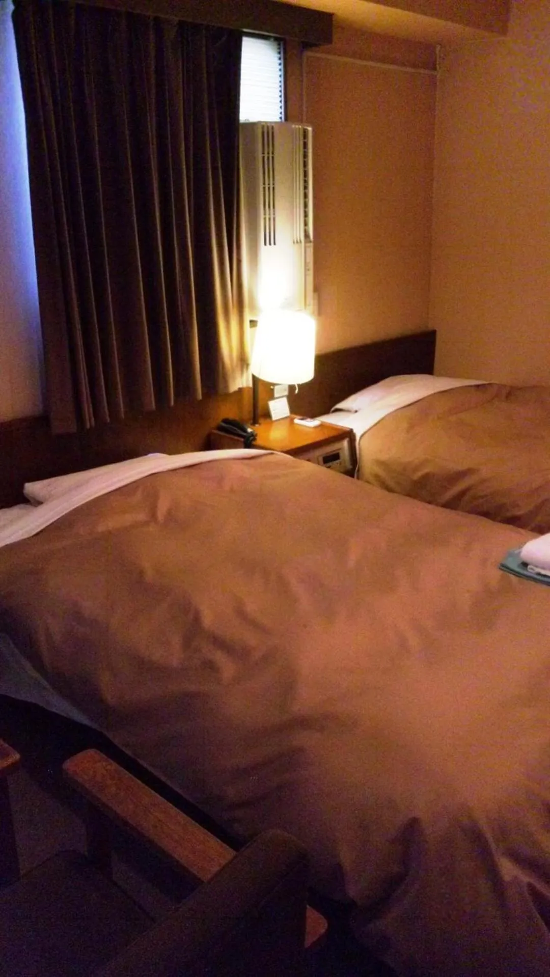 Bed in Hotel Takamatsu Hills