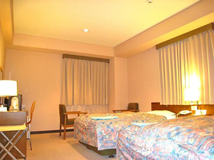 Bed in Hotel Takamatsu Hills