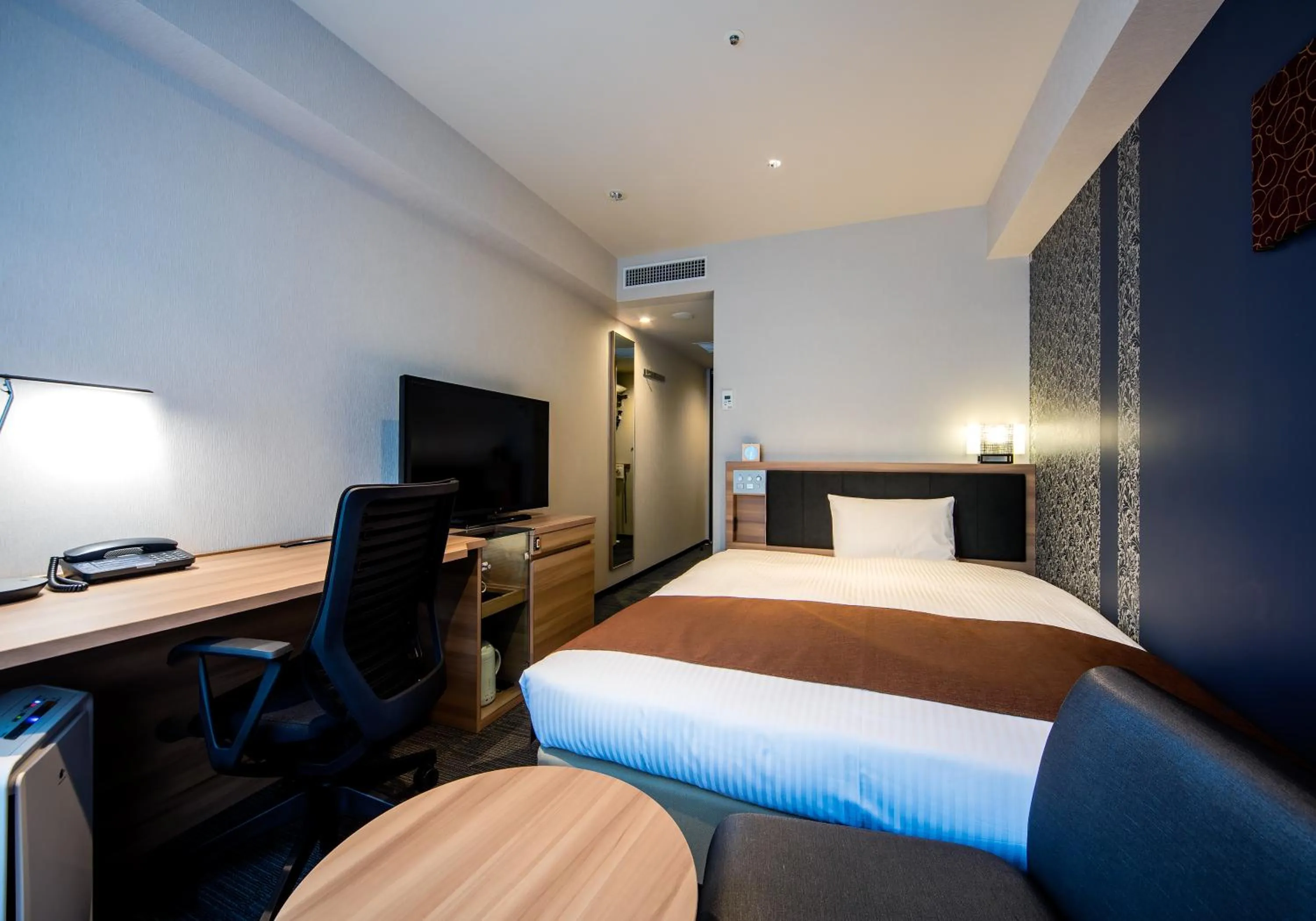 Photo of the whole room, Bed in Daiwa Roynet Hotel Kokura Ekimae