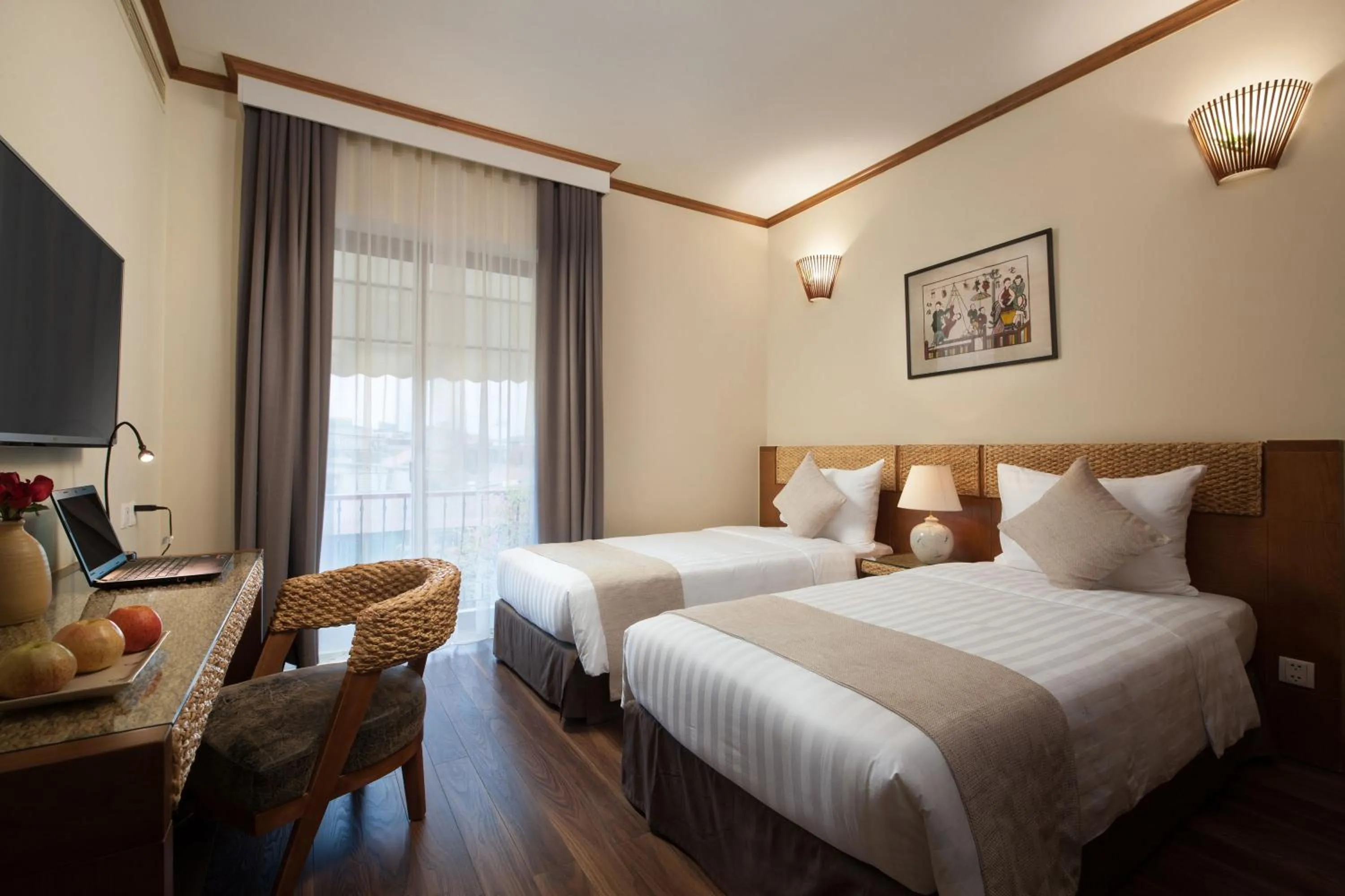 Bed in MK Premier Boutique Hotel