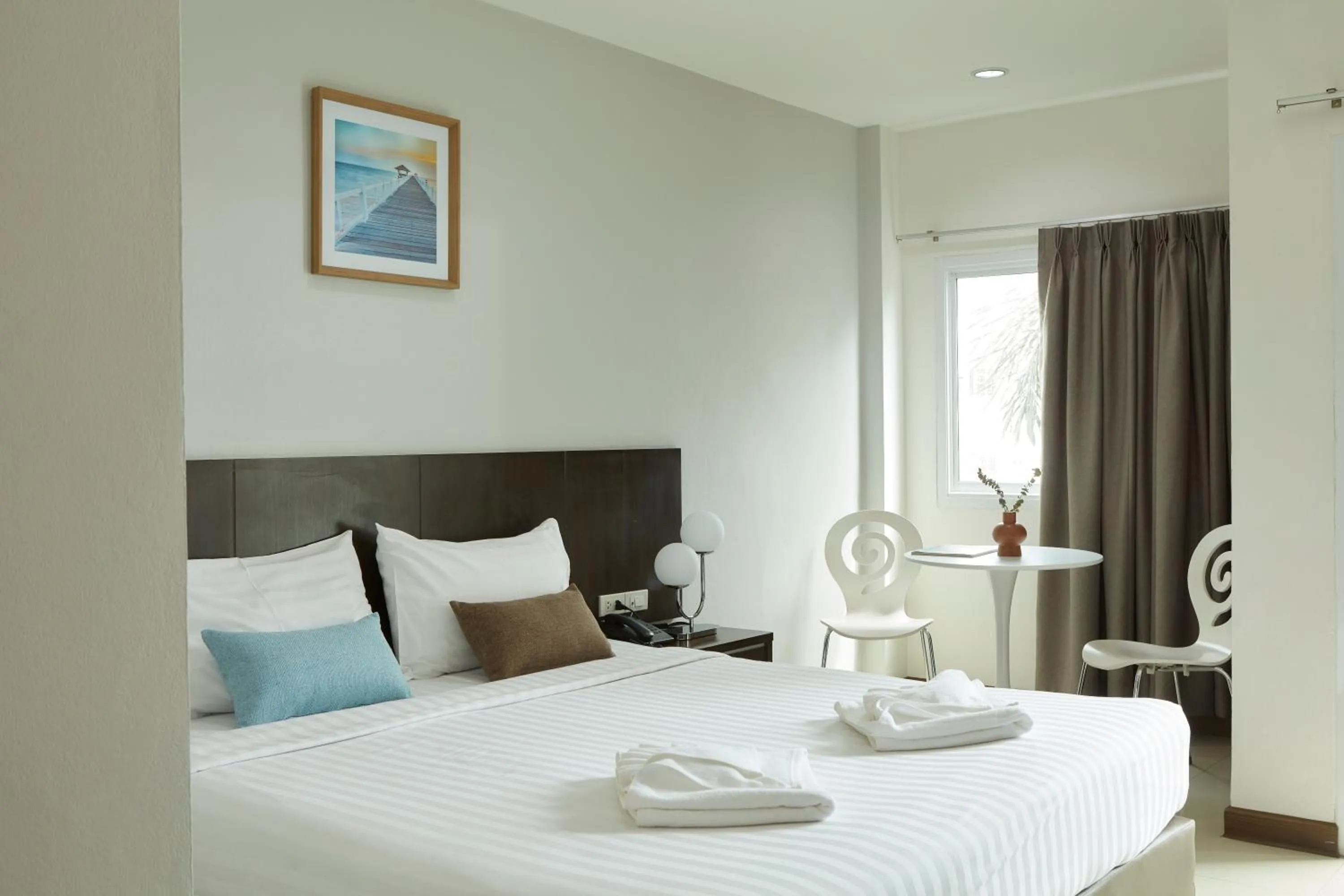 Bed in Rhienchai Place Hotel