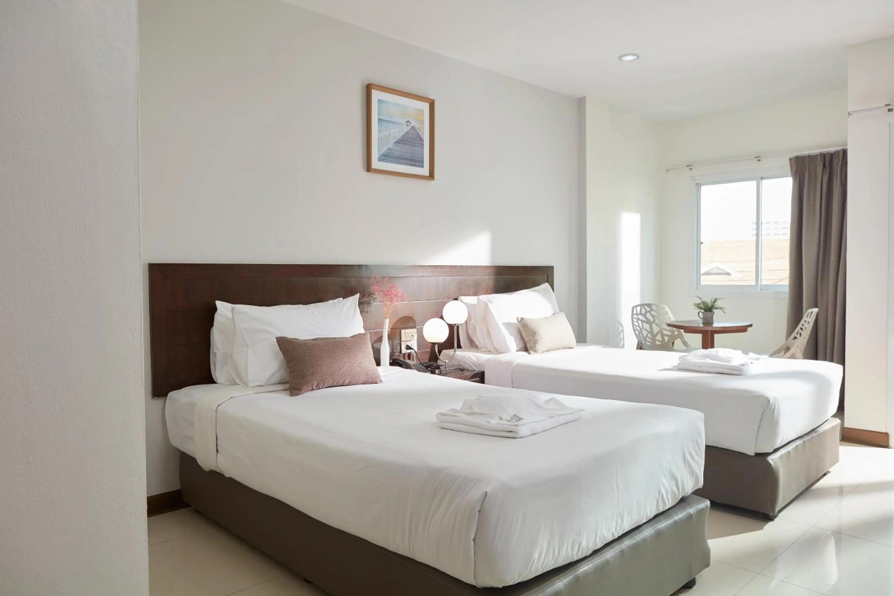 Bed in Rhienchai Place Hotel