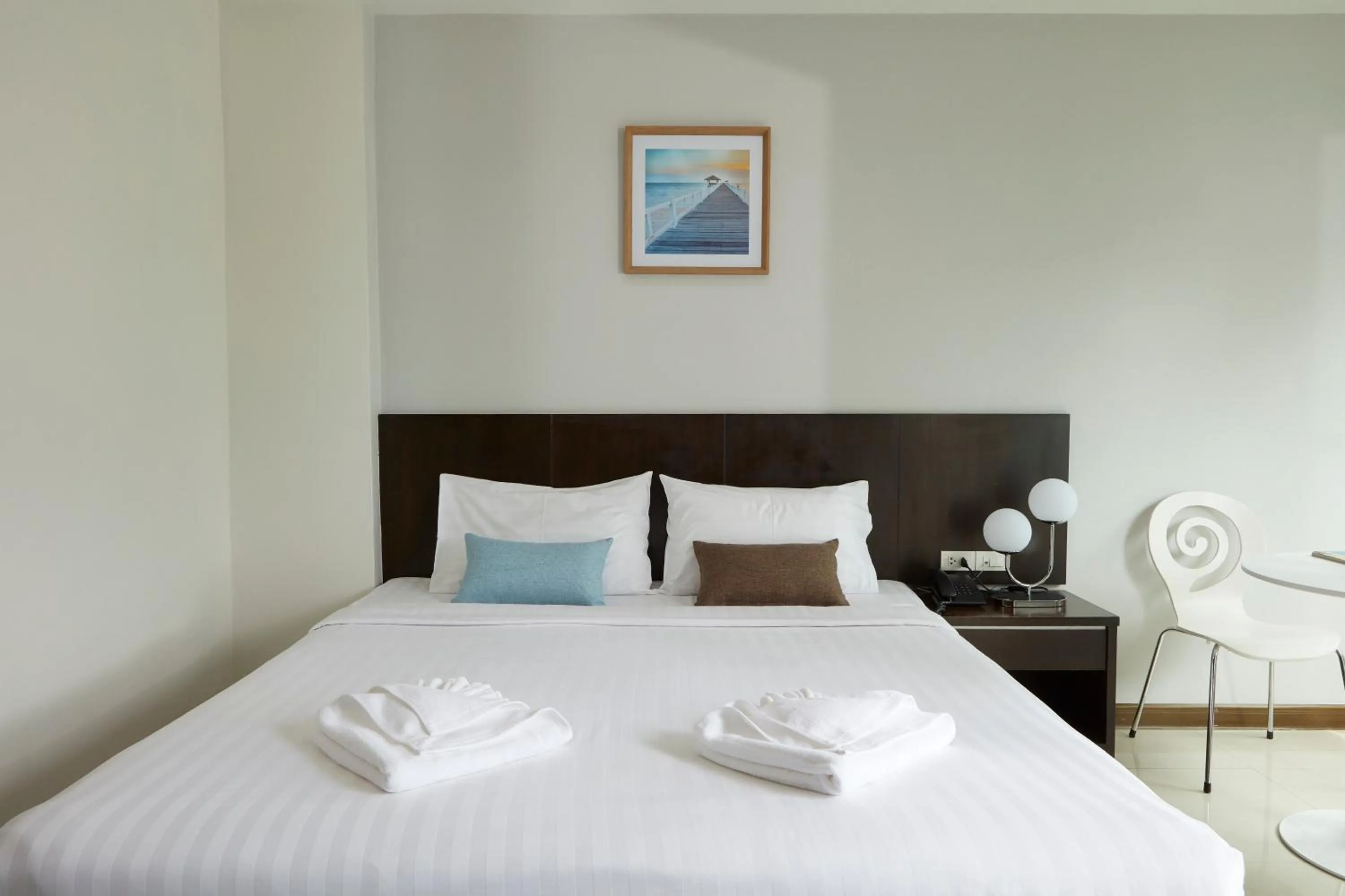 Bed in Rhienchai Place Hotel