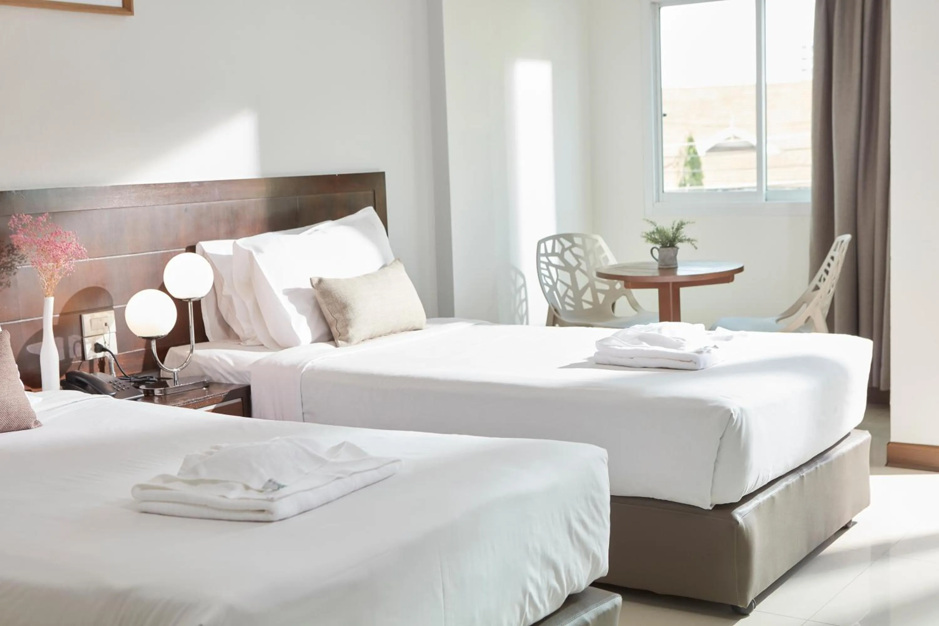 Bed in Rhienchai Place Hotel