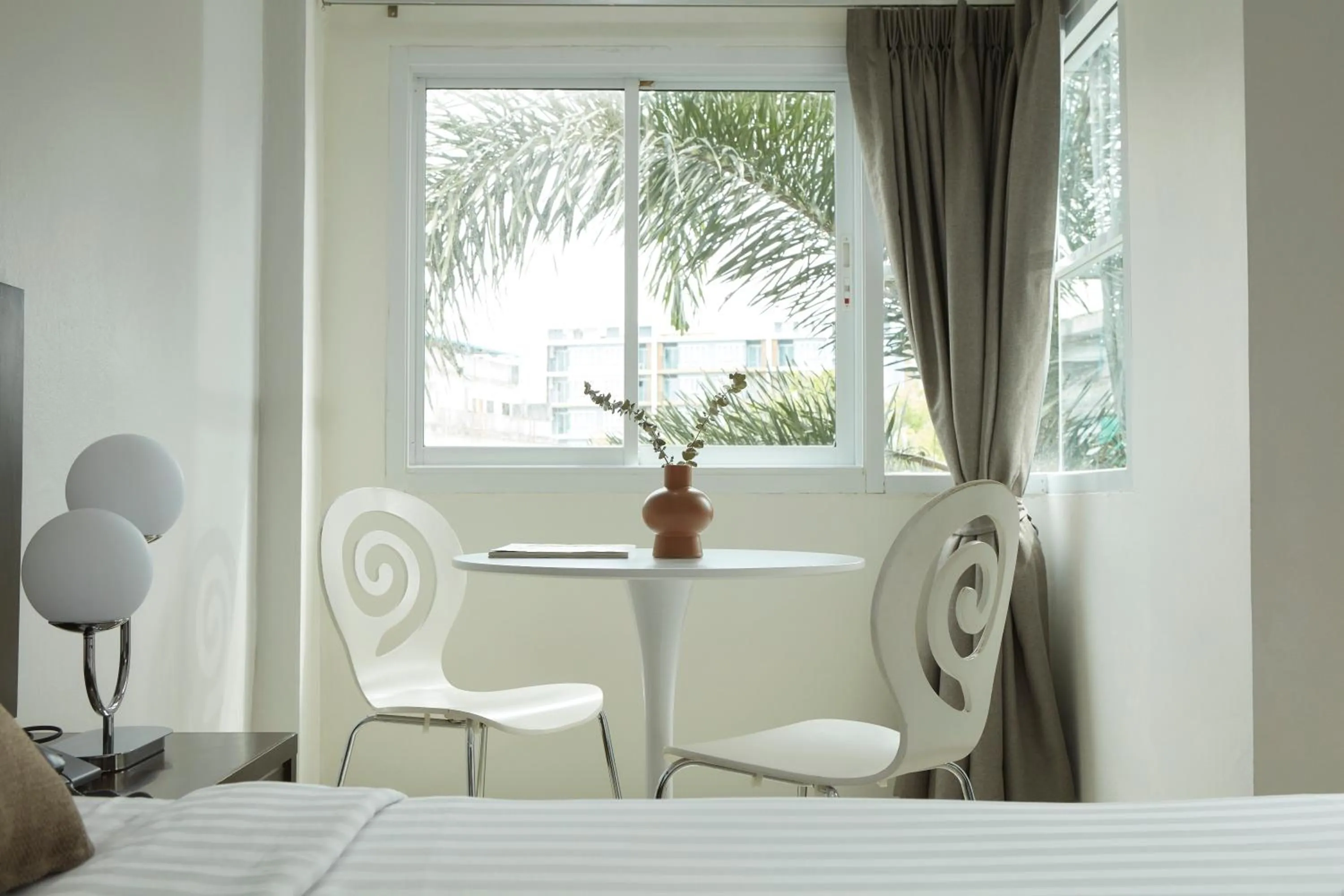 Bed in Rhienchai Place Hotel