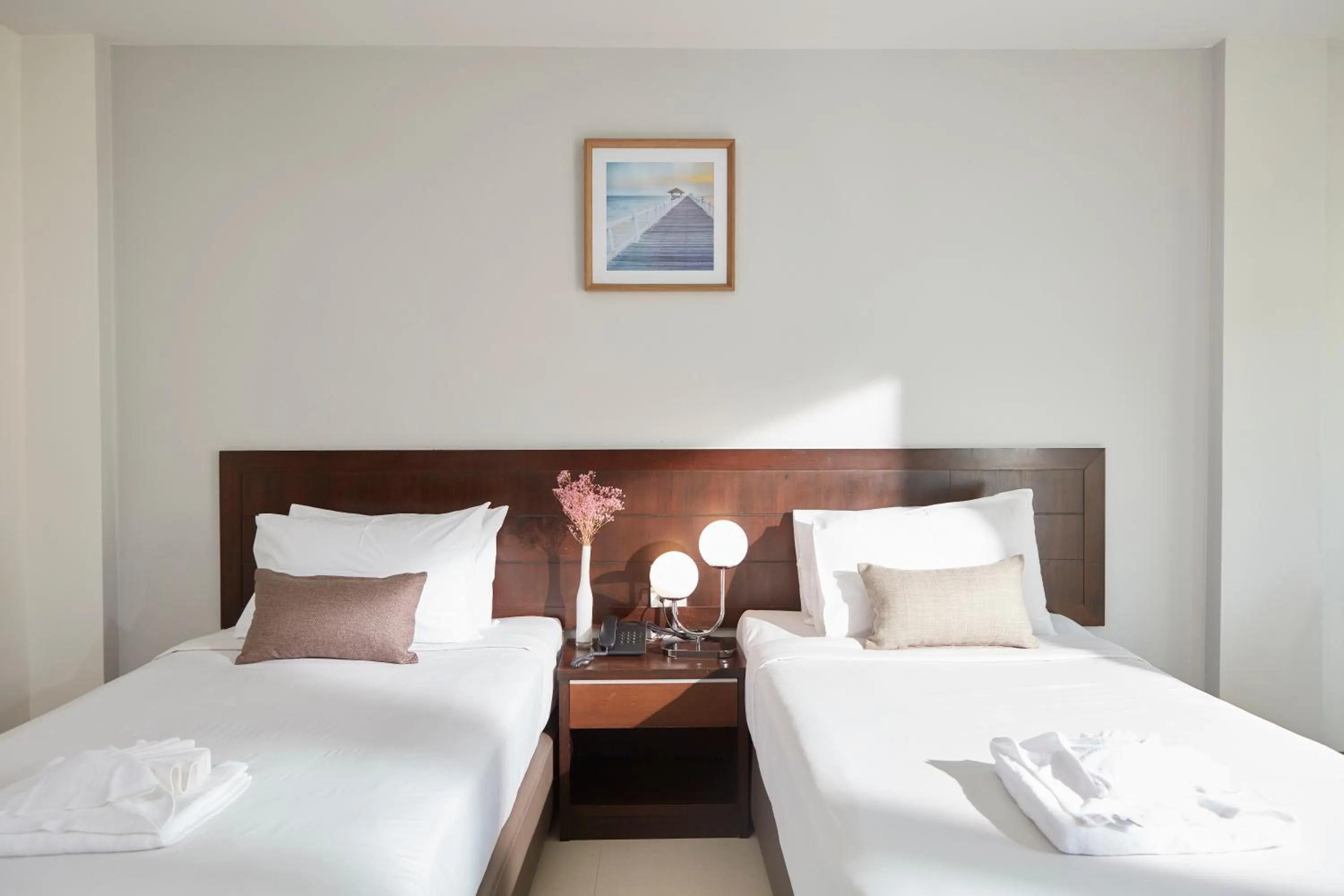 Bed in Rhienchai Place Hotel