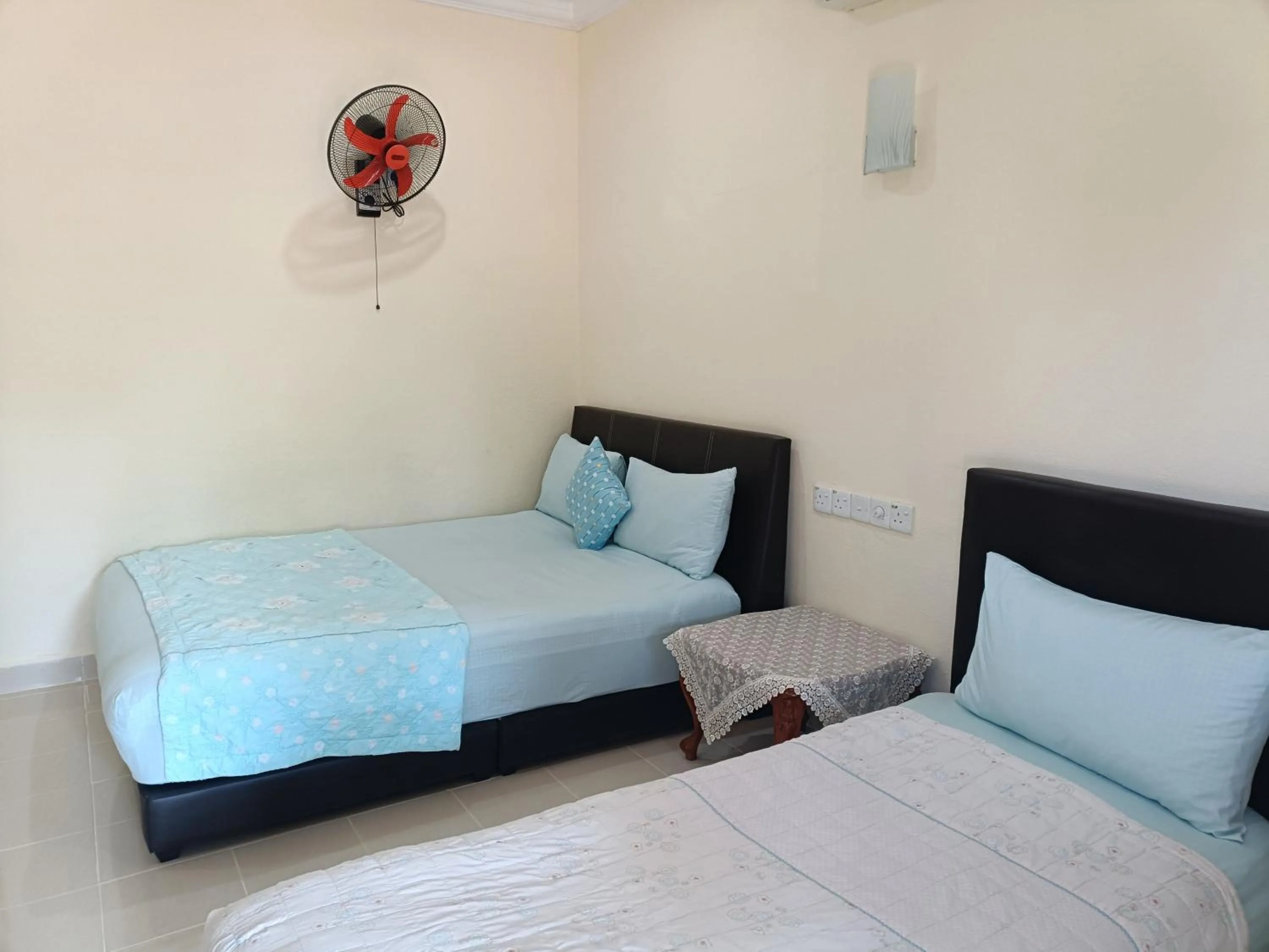 Bed in Motel Aurora Damai