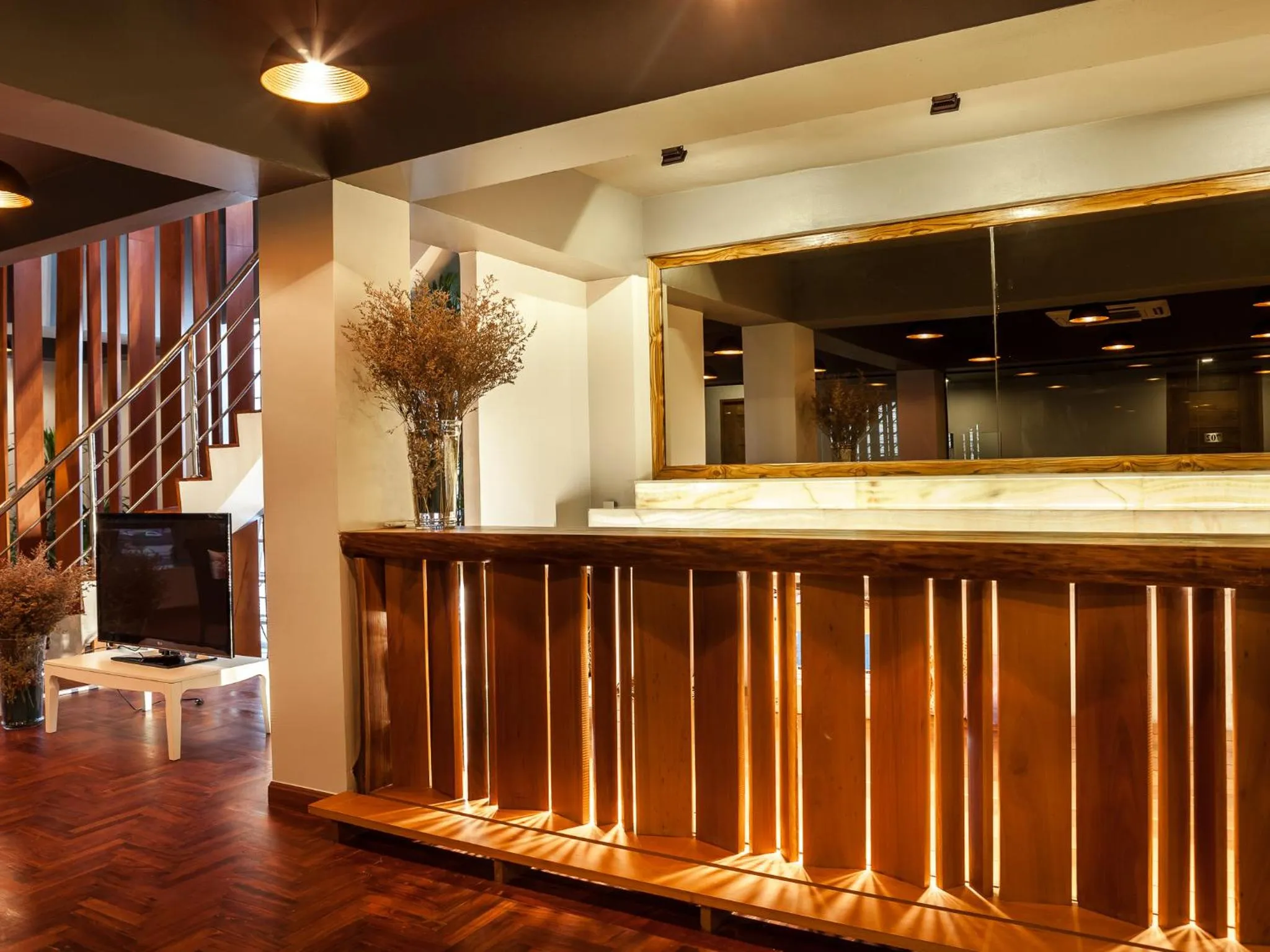 Communal lounge/ TV room in Metro Pratunam Boutique Hotel