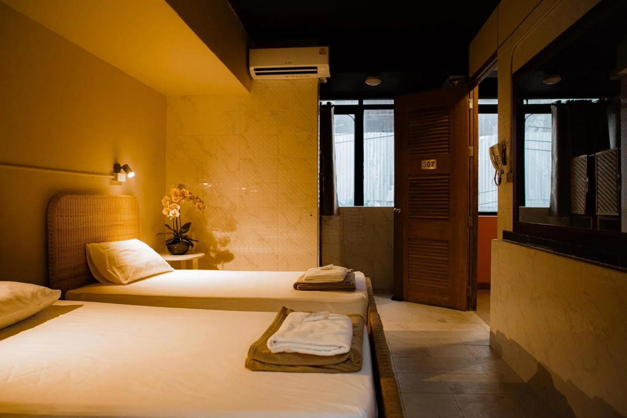 Bed in Metro Pratunam Boutique Hotel