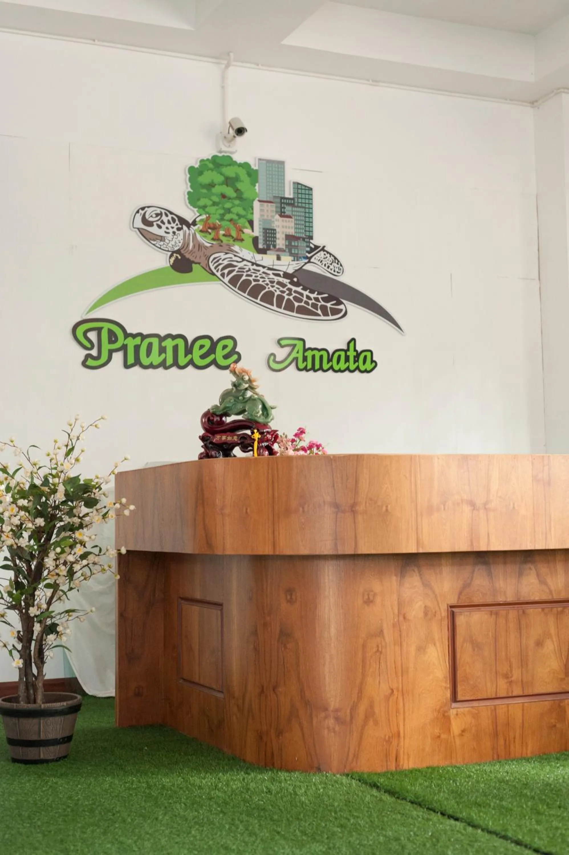 Property logo or sign in Pranee Amata