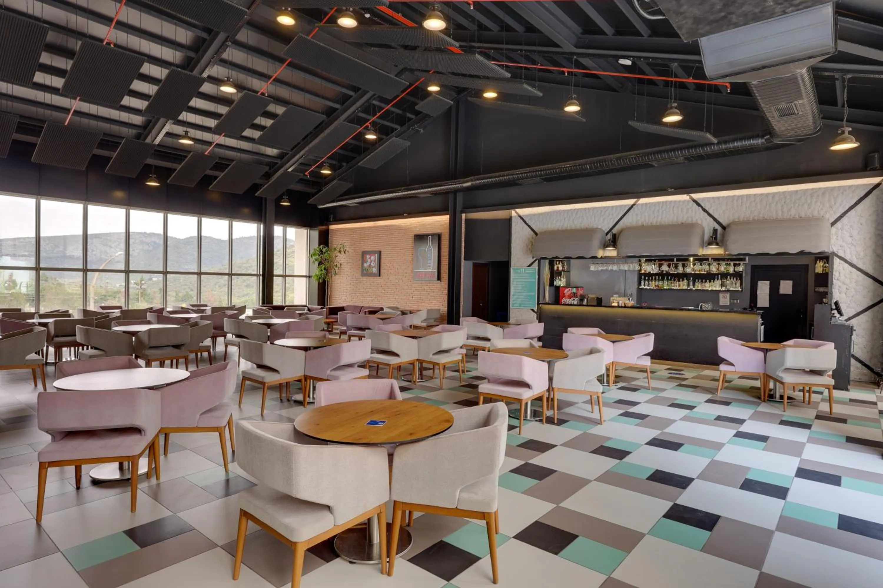 Lounge or bar in Ramada Hotel & Suites by Wyndham Kusadasi