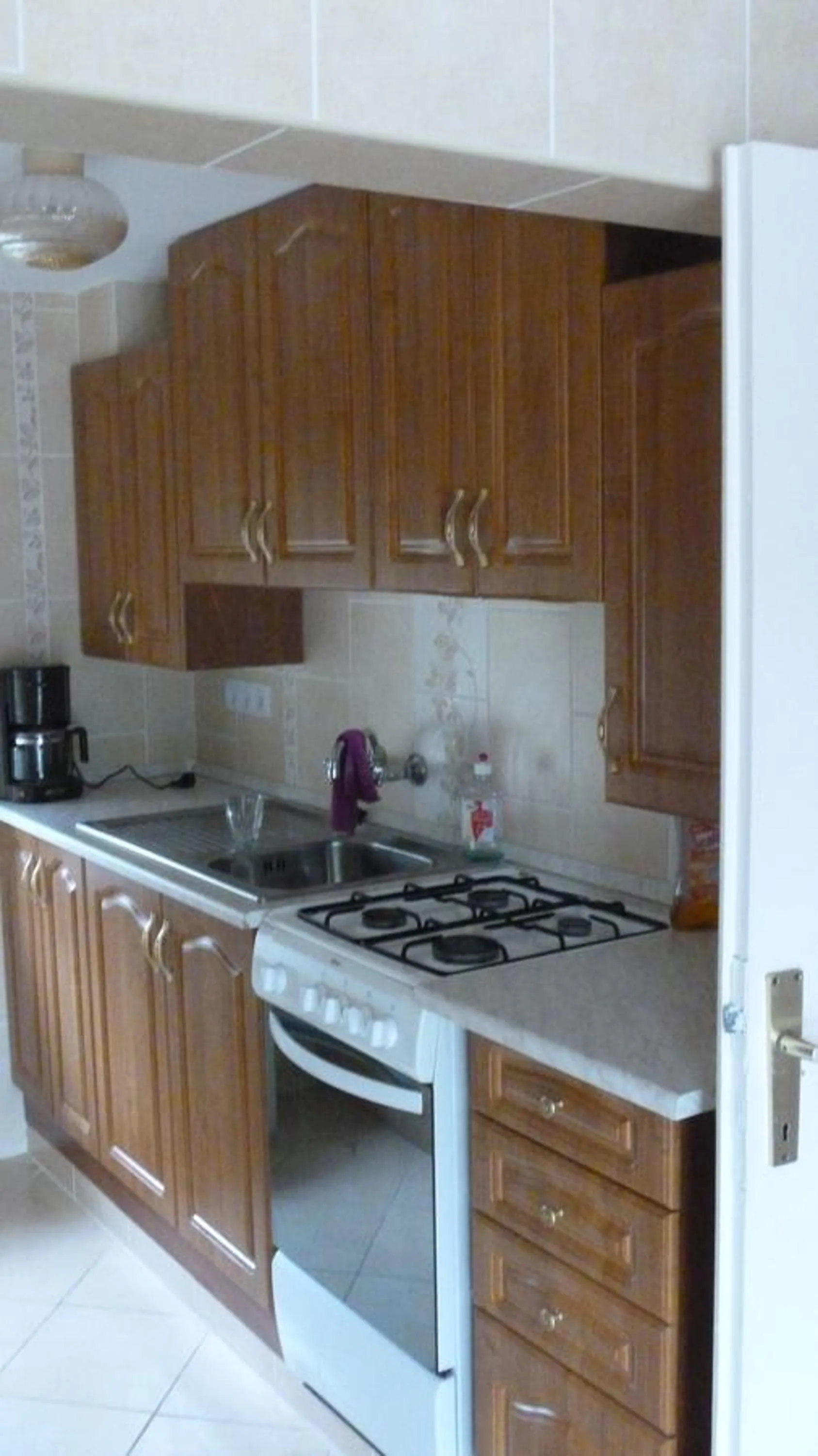 Communal kitchen in Family Home Apartment