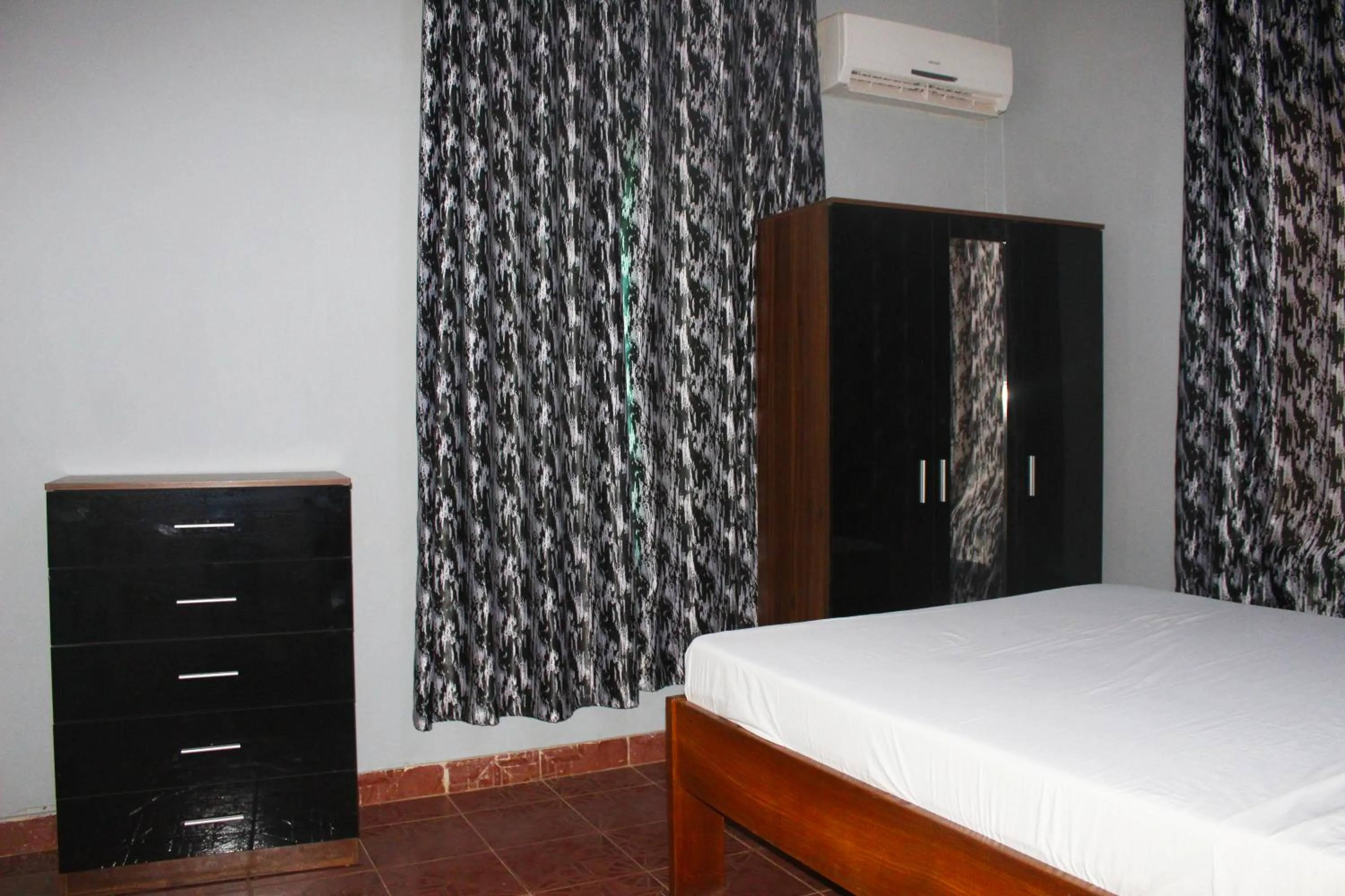 Bedroom, Bed in Harmony house apartments