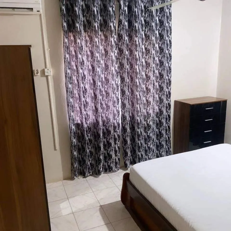 Bedroom, Bed in Harmony house apartments