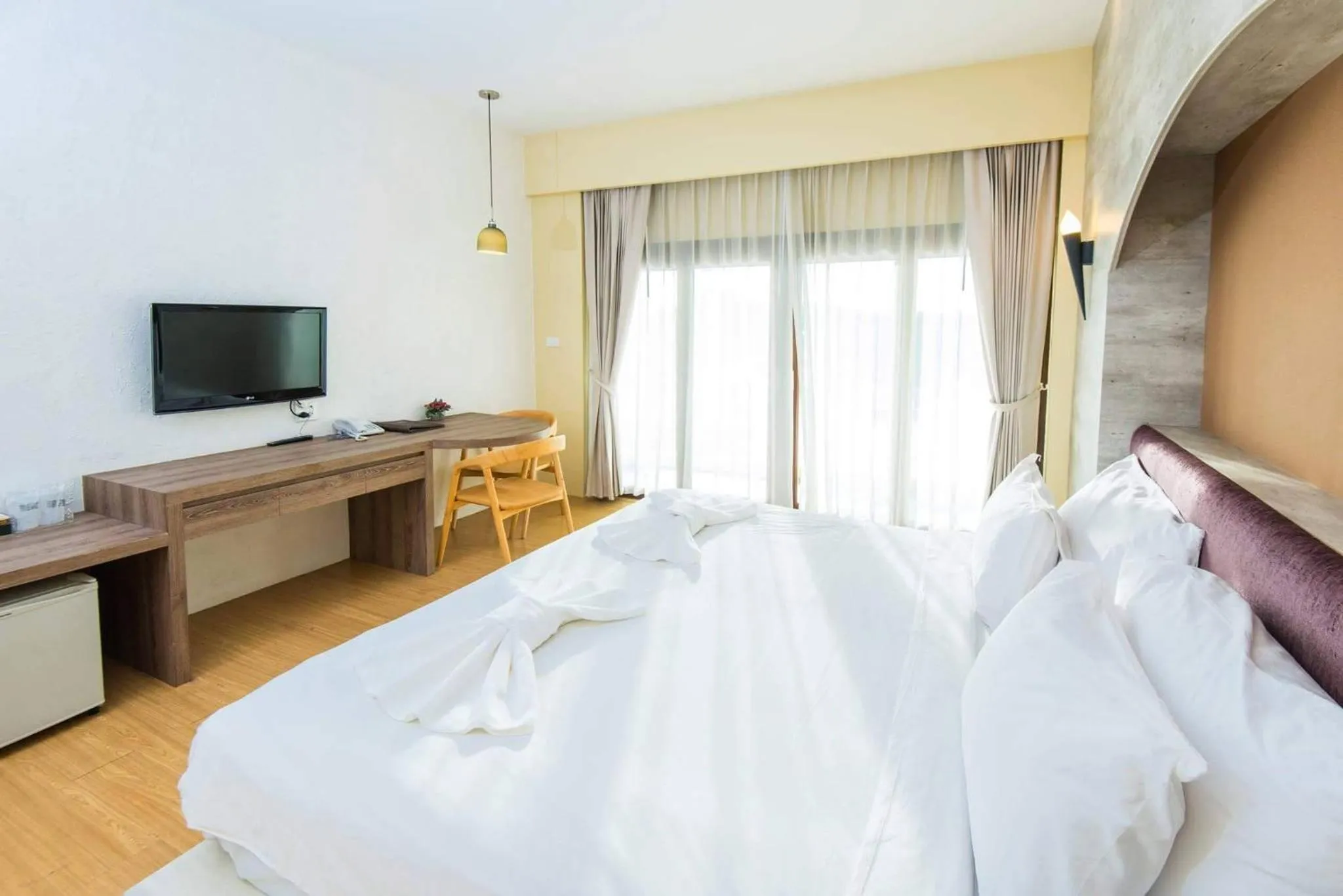 Bed in Baan Talay See Cream Resort