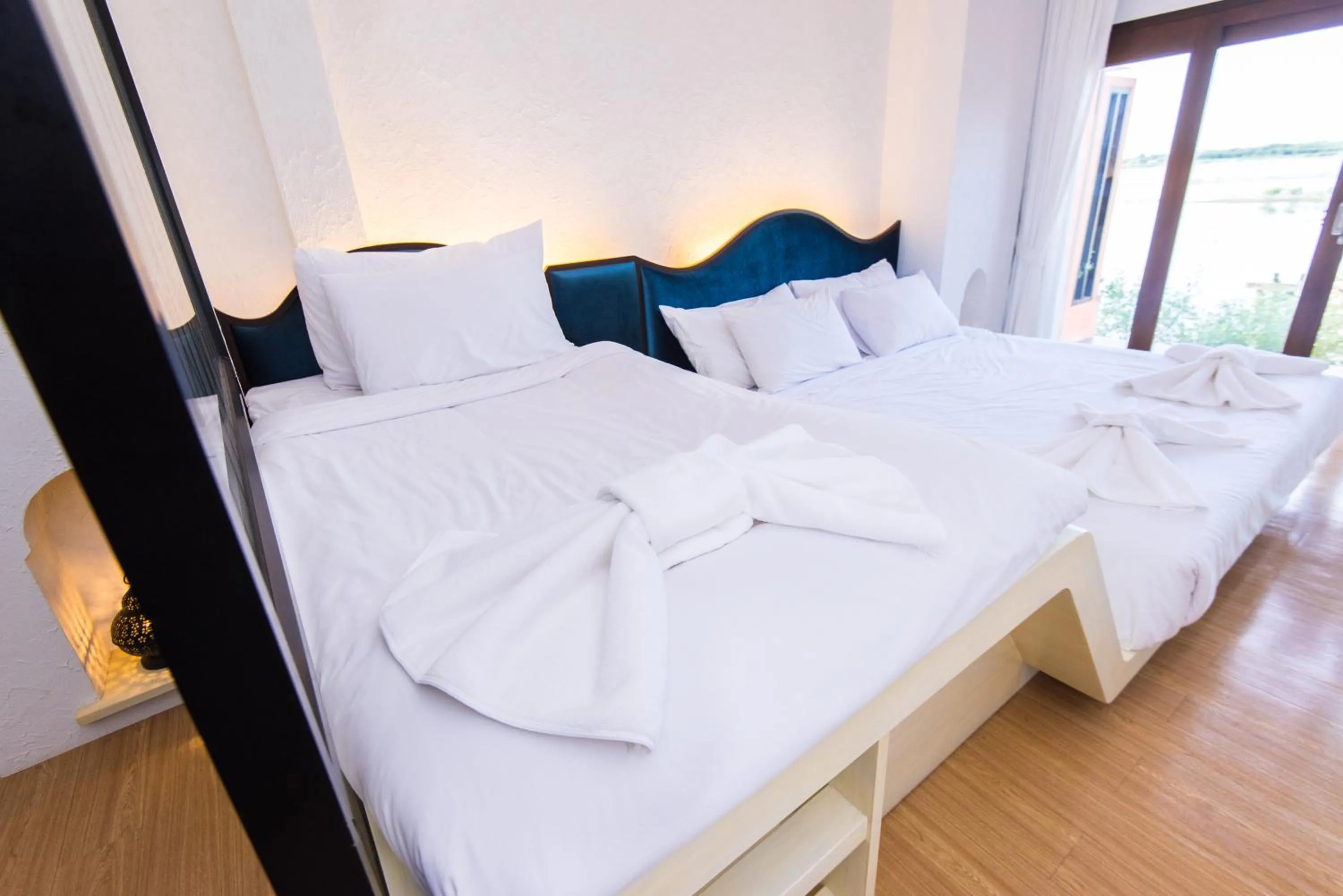 Bed in Baan Talay See Cream Resort