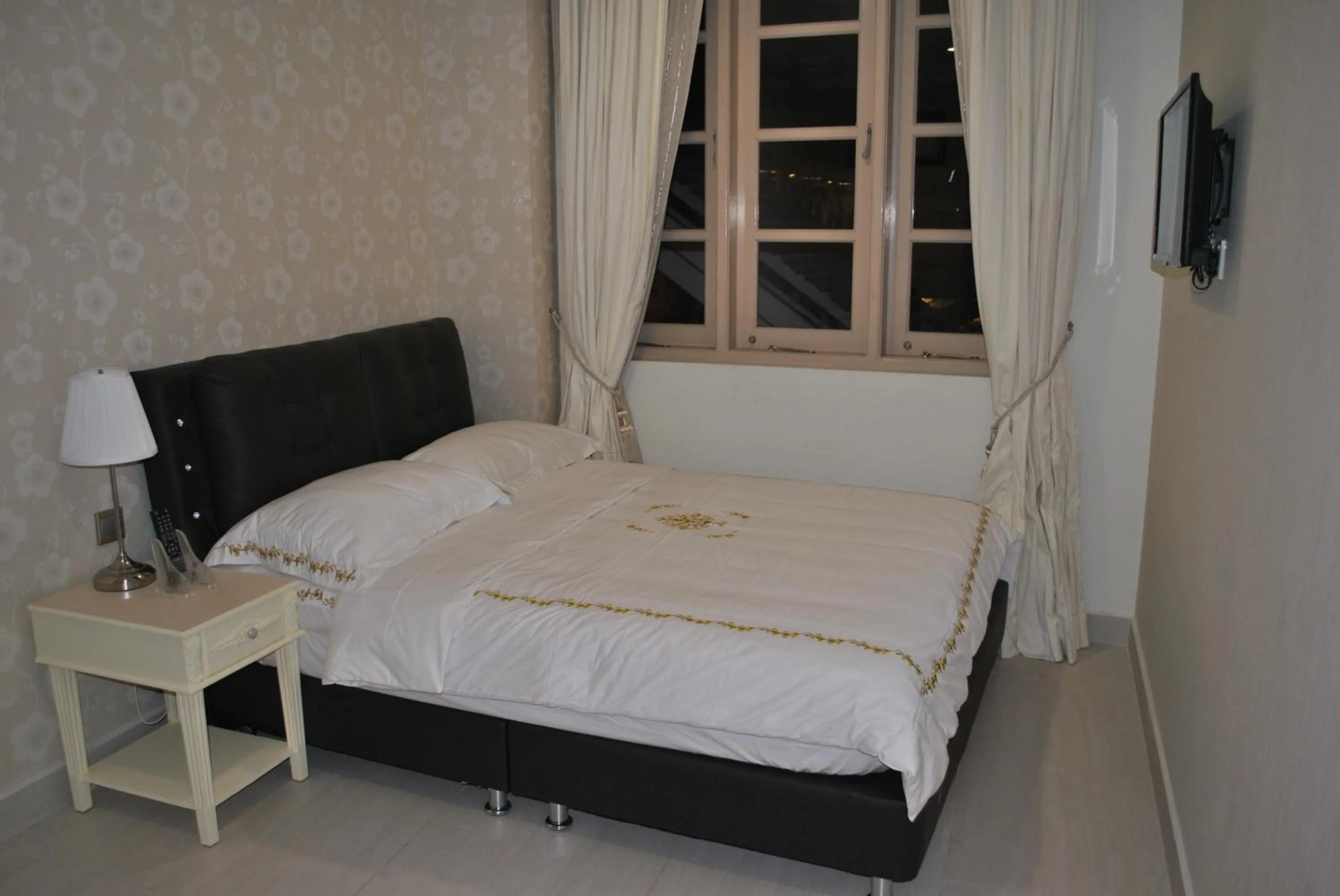 Bed in Jayleen Clarke Quay Hotel