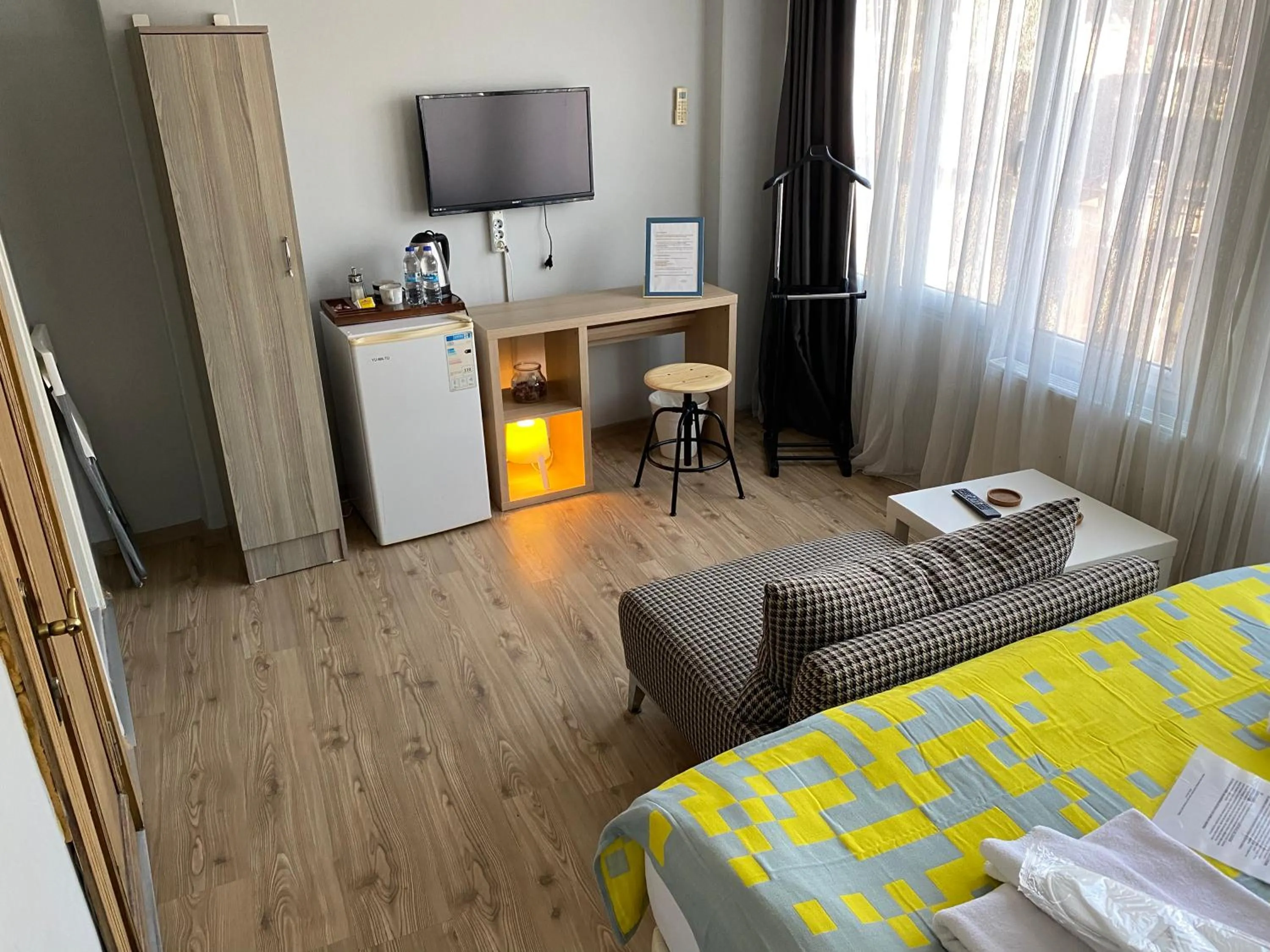 TV and multimedia, Bed in Goji's Apartments