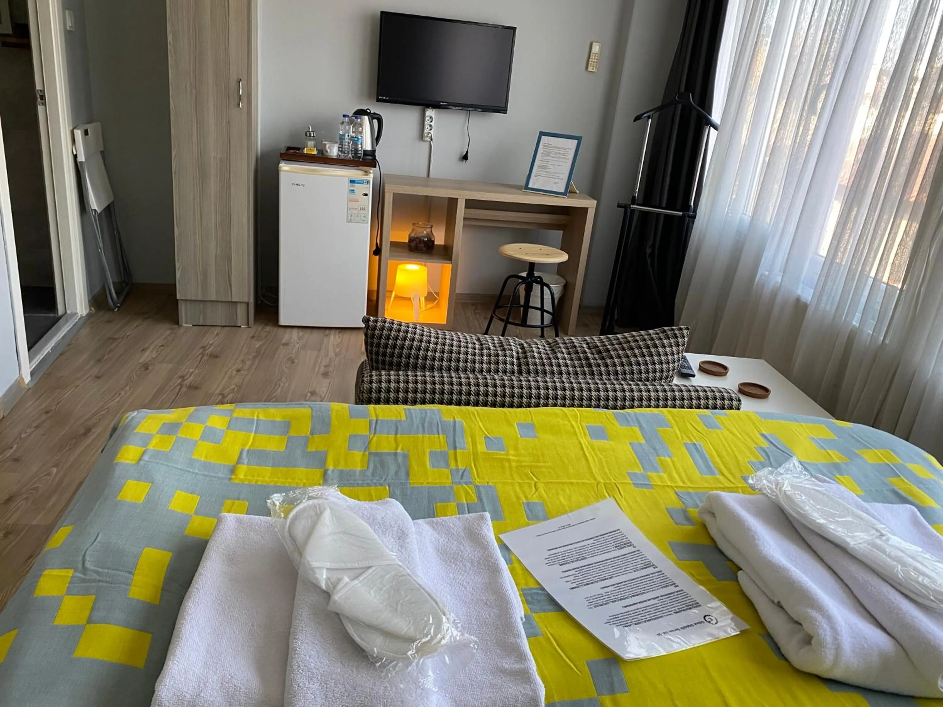 TV and multimedia, Bed in Goji's Apartments