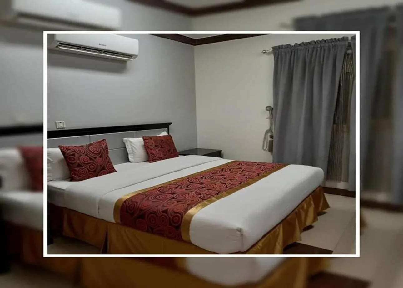 Bed in شقق نطوان للشقق المخدومة