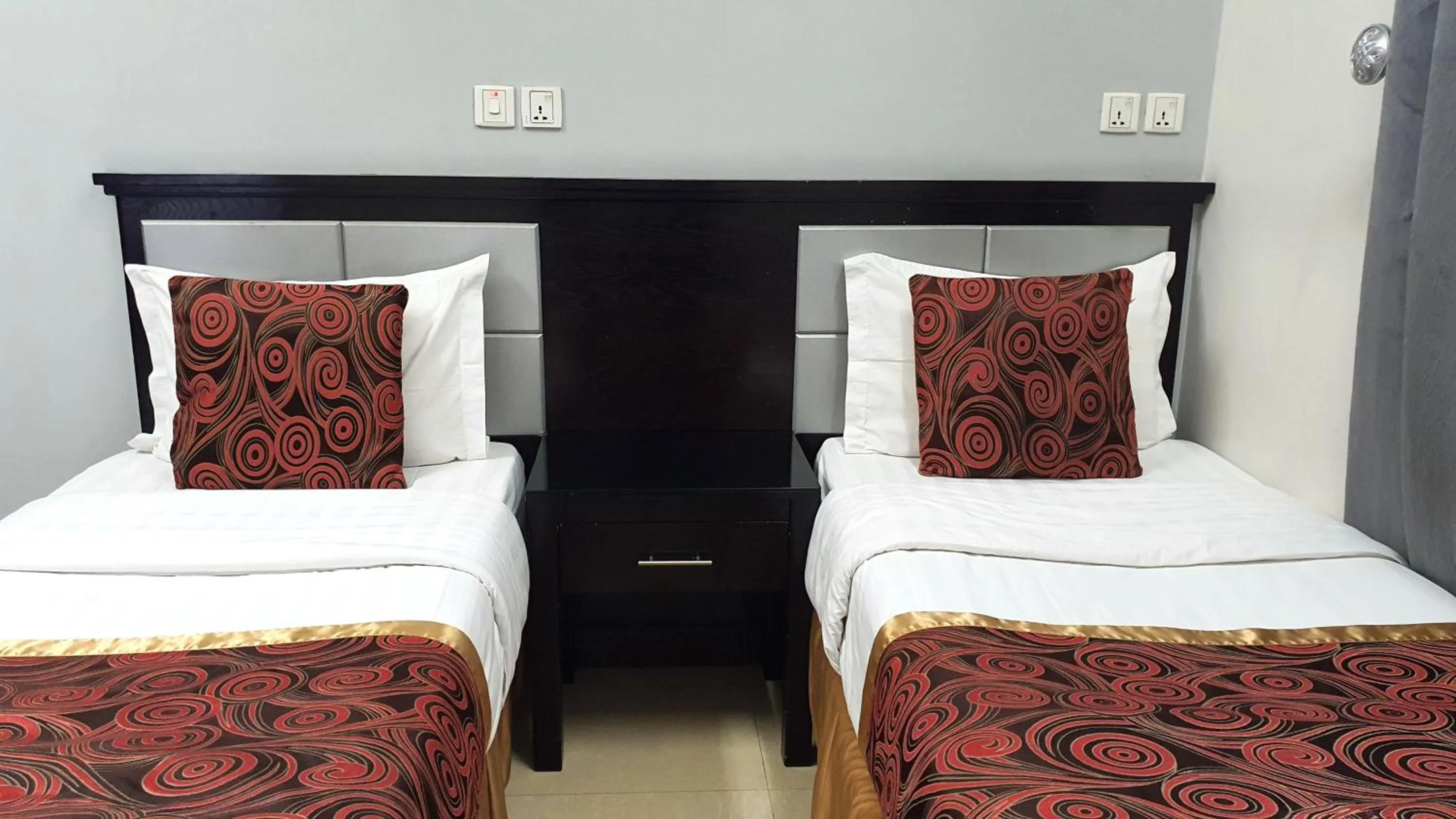 Bed in شقق نطوان للشقق المخدومة